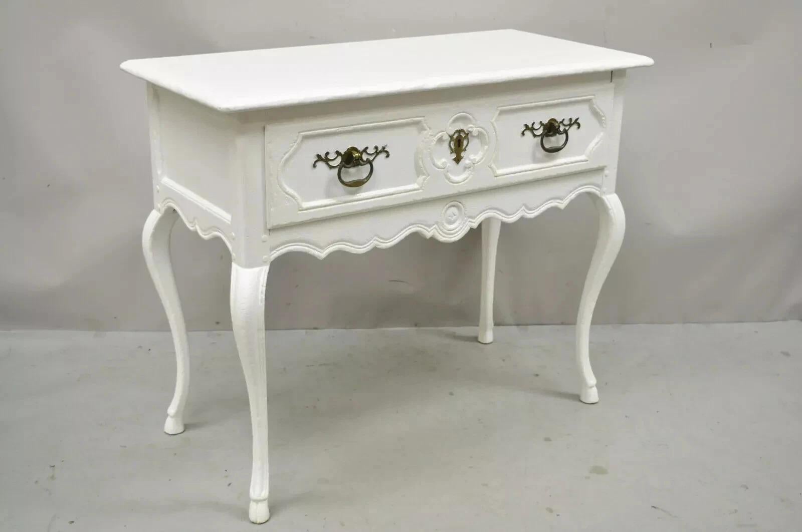 Vintage Baker French Country Regency Hoof Foot White Painted One Drawer Console Table. Item features carved hoof feet, solid wood construction, distressed finish, original label, 1 dovetailed drawer, cabriole legs, quality American craftsmanship.