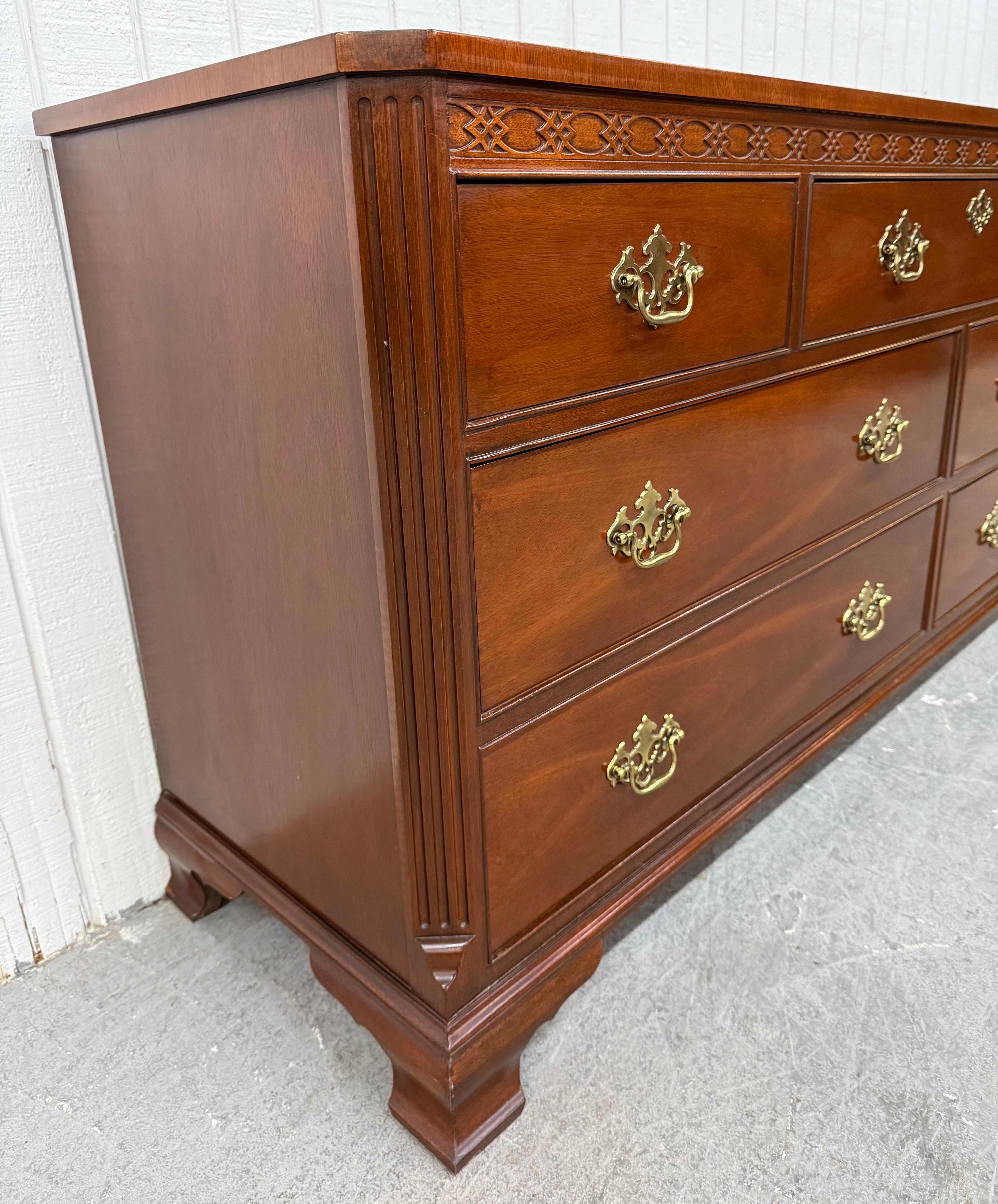 This listing is for a Vintage Baker Furniture 7-Drawer Mahogany Dresser. Featuring a traditional design, seven drawers for storage, original brass hardware, and a beautiful mahogany finish. This is an exceptional combination of quality and design by