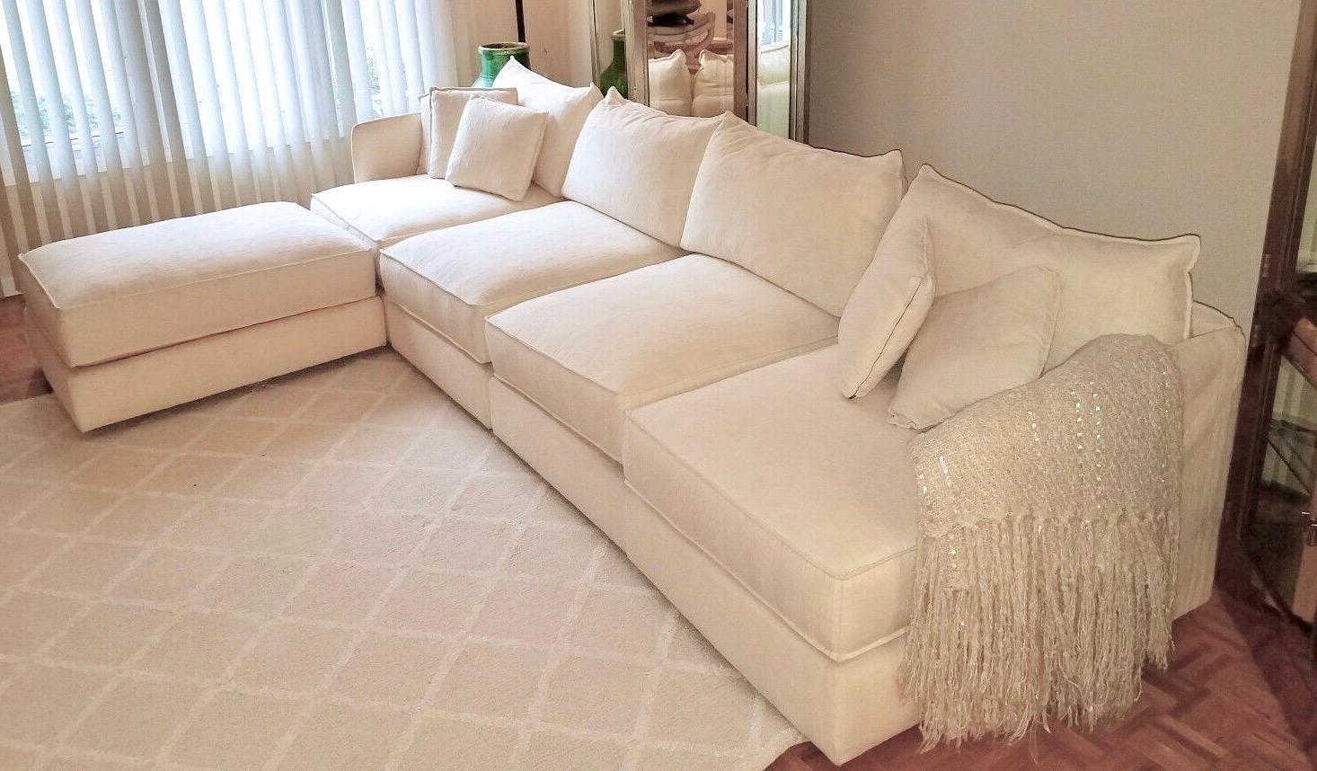 Vintage baker furniture sectional sofa with ottoman, four-seat, linen cream Bouclé-like original textile. Gorgeous lines and exceedingly comfortable. Down cushions. Four seats can come together to form long sofa or set up in a variety of
