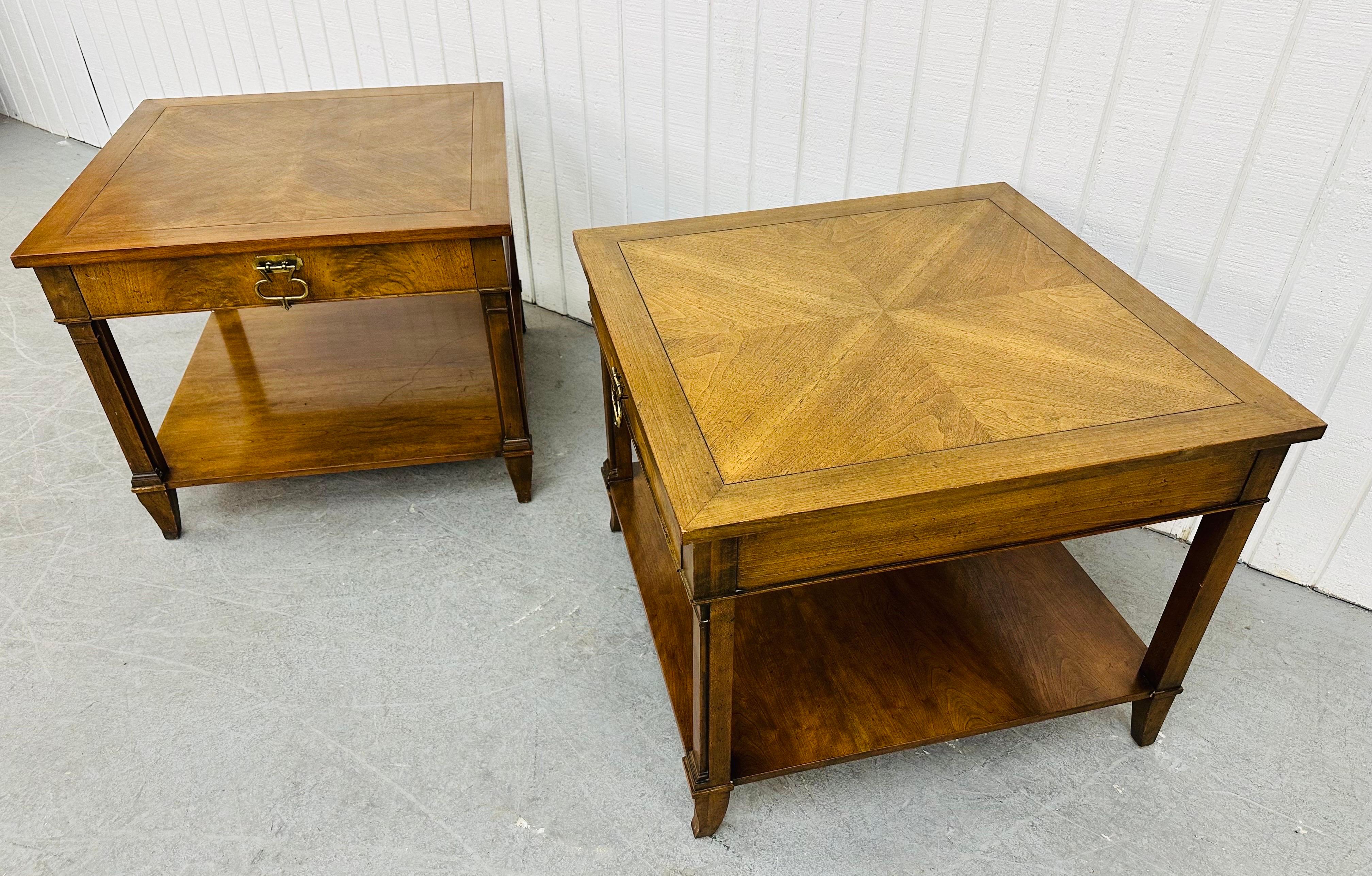 This listing is for a pair of vintage Baker Furniture Square Walnut Side Tables. Featuring a straight line design, square top, single drawer with original brass pull, bottom tier for storage space, and a beautiful walnut finish. This is an