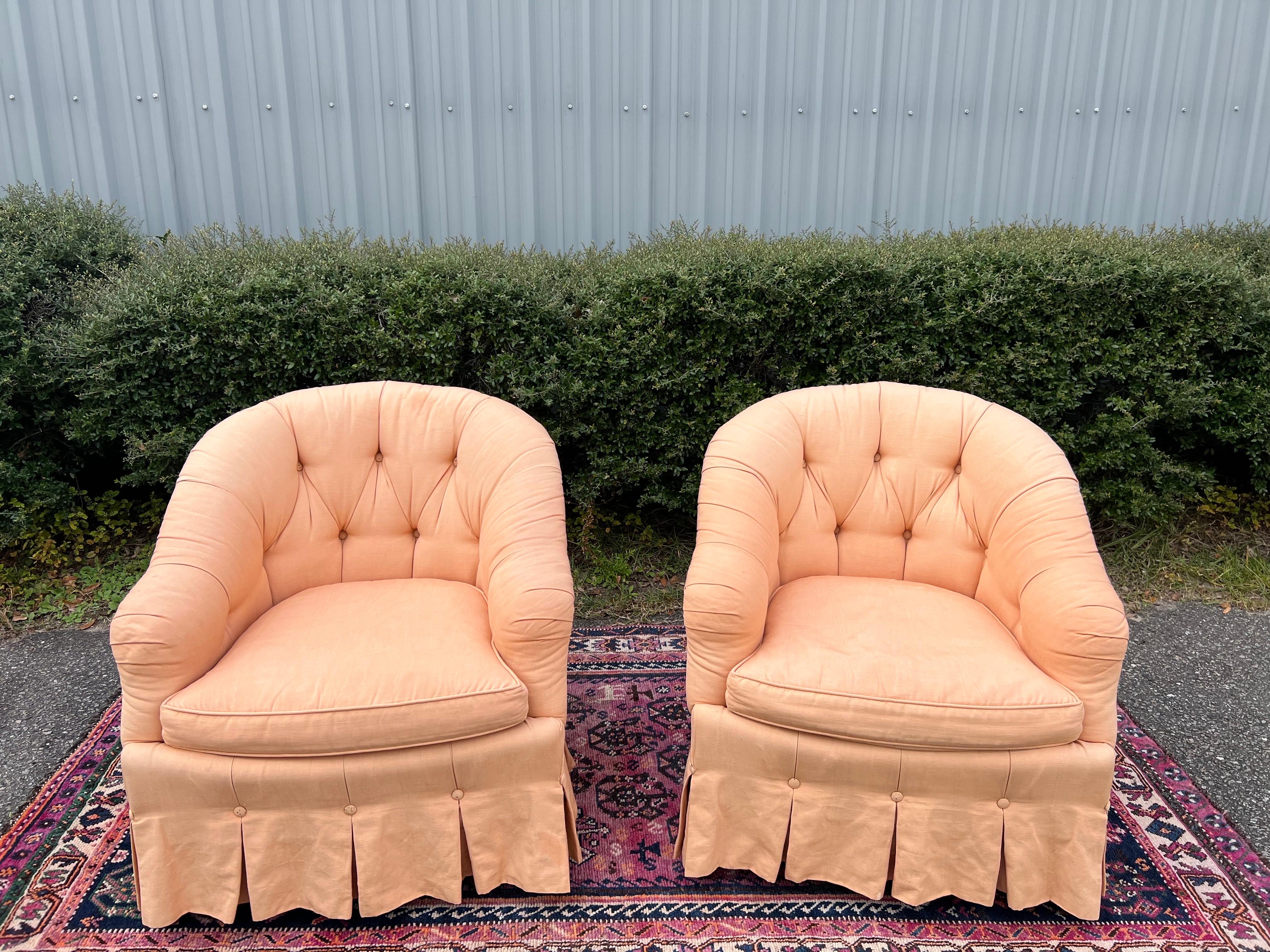 Vintage Baker Furniture Tufted Upholstered Club Chairs - a Pair

Featured is an elegant Pair of Tufted Upholstered Club Chairs; both still retaining their original Baker Furniture Signature.  Button tufted tub shaped backs with sloping arms and wide
