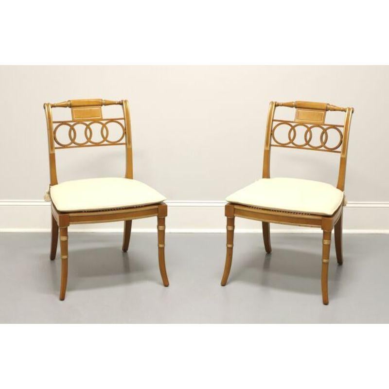 A pair of Regency style dining side chairs from top-quality furniture maker Baker, from their Historic Charleston Collection, the 