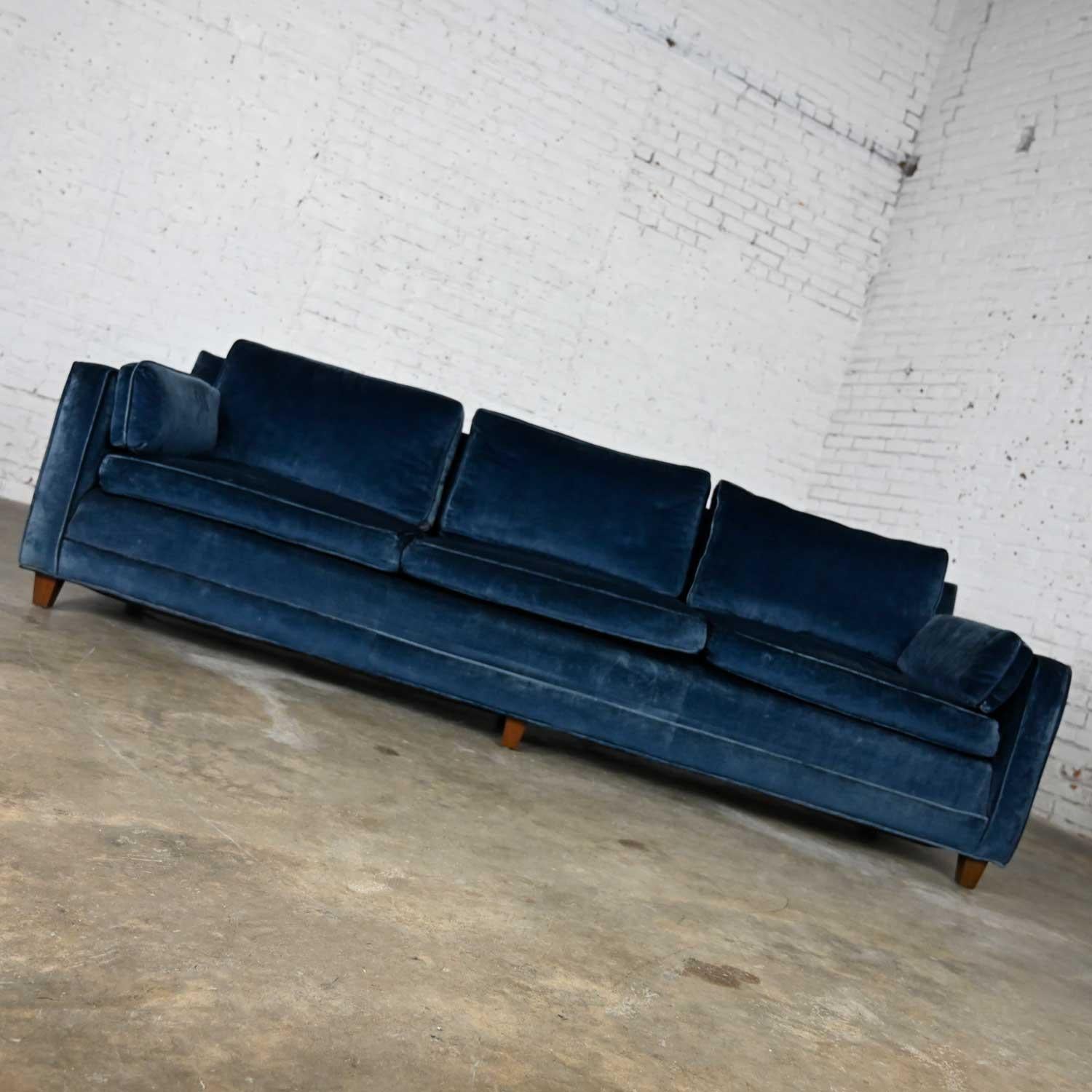 Wonderful vintage Baker Lawson style low profile sofa in Bellagio cobalt fabric by Fabricut. There are a few water spots along the front lower center and edge of the sofa and one of the cushions and a spot on one of the cushions that looks like a