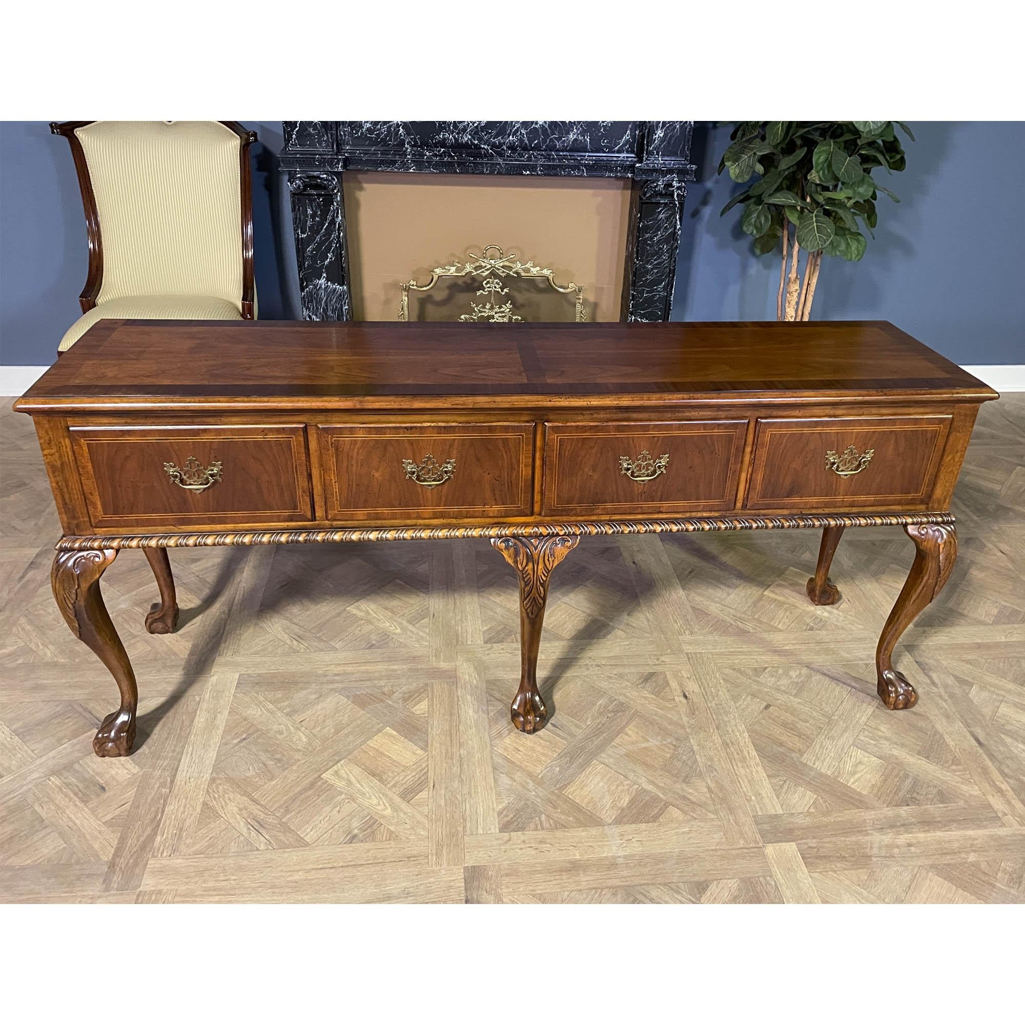 A Vintage Baker Sideboard brought to you by Niagara Furniture. A classic shape this cabinet features four total drawers that make this piece both functional and attractive. The Vintage Baker Sideboard would make a great addition to almost any space