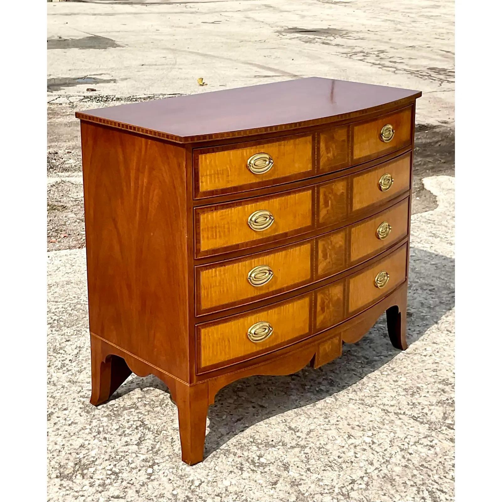 Spectacular vintage Burl chest of drawers. Made by the iconic Baker Furniture group. Part of the highly coveted Williamsburg Collection made to the exact specifications of registered Colonial Williamsburg pieces. A real collectors item. Acquired