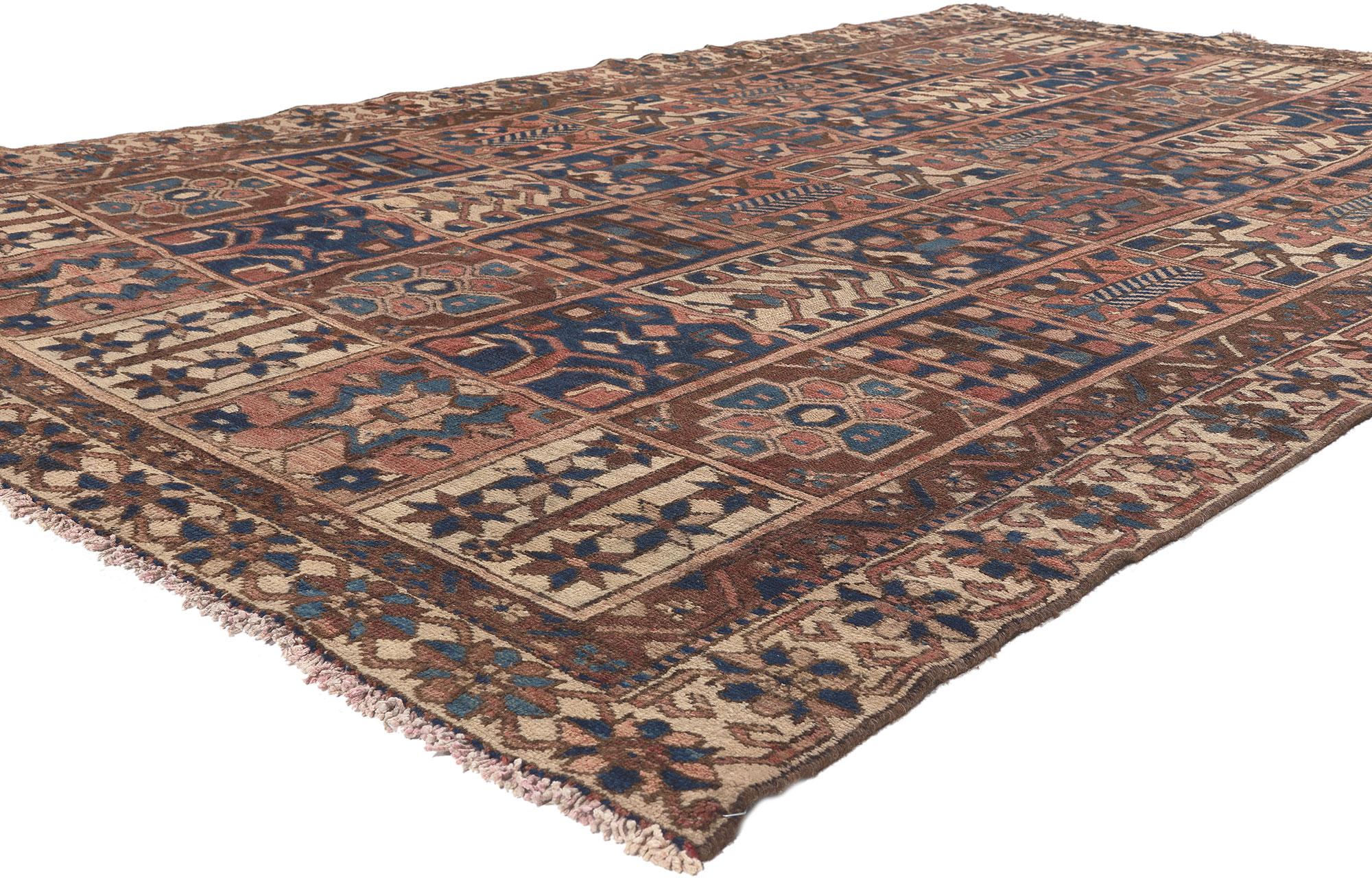 75872 Vintage Persian Bakhtiari Rug, 06'01 X 09'05.
Biophilic Design meets esoteric elegance in this vintage Persian Bakhtiari rug. The four seasons garden design and warm earth-tone colors woven into this piece work together creating a