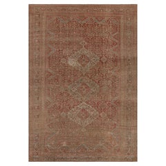 Alfombra vintage de estilo Bakhtiari en rojo con motivos geométricos