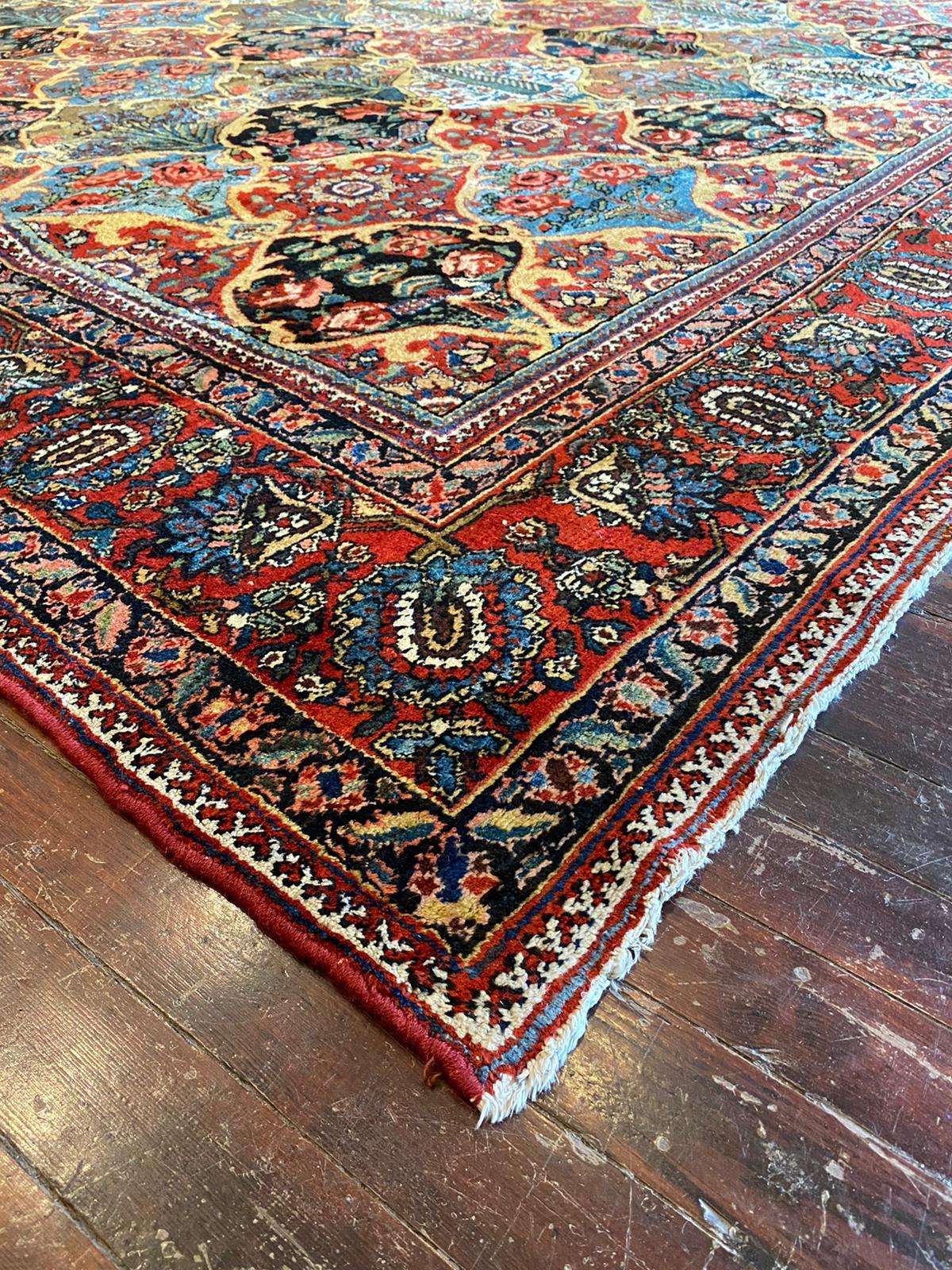 The Vintage Bakhtiyar Rug is a true masterpiece that exudes timeless charm and beauty. Its color palette, adorned with deep browns, rich reds, warm tans, calming blues, regal gold, creamy hues, and delicate rose accents, creates a stunning array of