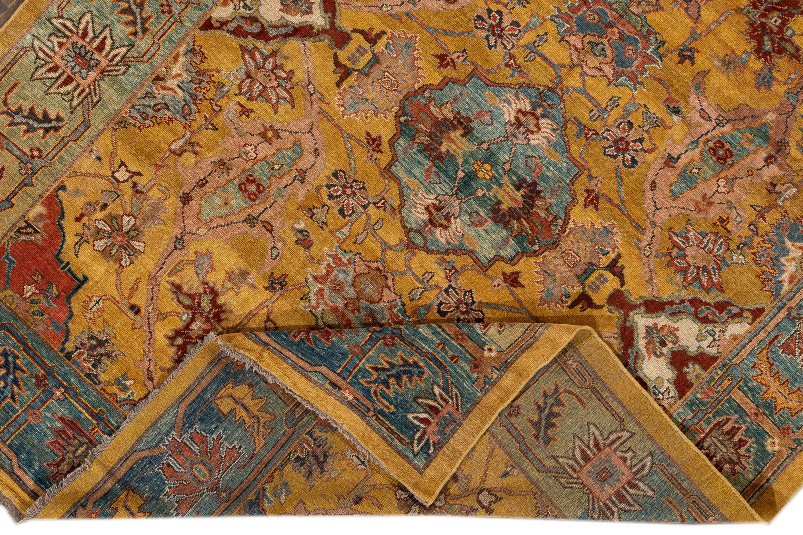 Beautiful vintage Bakshaish wool rug with a yellow field, and multi-color accents in an all-over geometric design.

This rug measures 7' 5