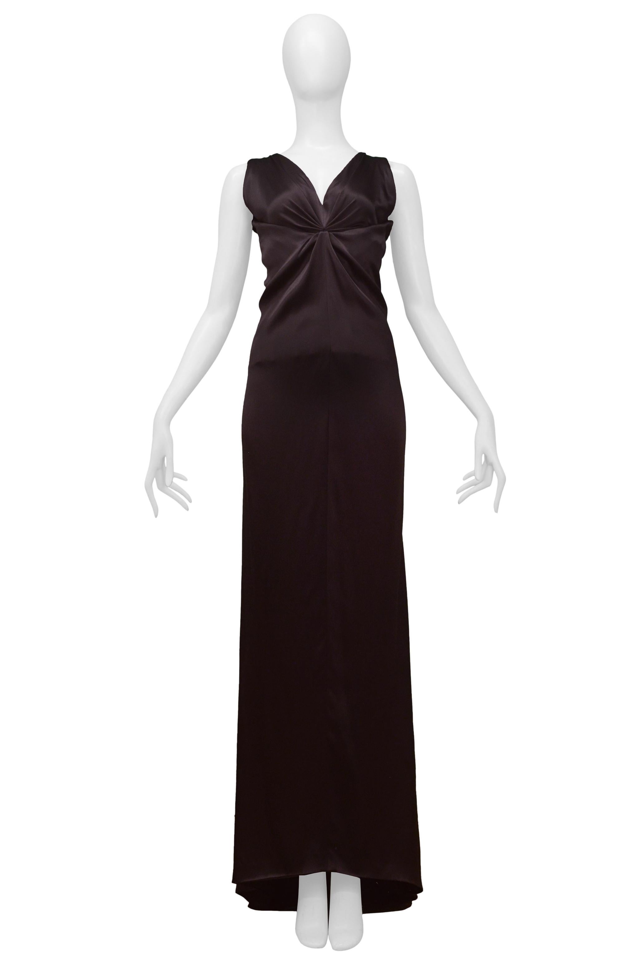 Resurrection Vintage is excited to offer a vintage dark brown satin Balenciaga by Nicolas Ghesquiere evening gown featuring a v neckline, bodice corset detail with contrasting interior fabric, sleeveless, snap back, and plunging back and train.