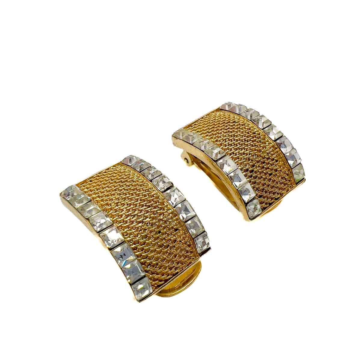 A pair of Vintage Balenciaga Crystal Mesh Earrings. Perfect structural design fulfilled with a meld of textures, these Balenciaga mesh and square cut crystal earrings are simply luscious. The ultimate in couture classics.

Balenciaga is world
