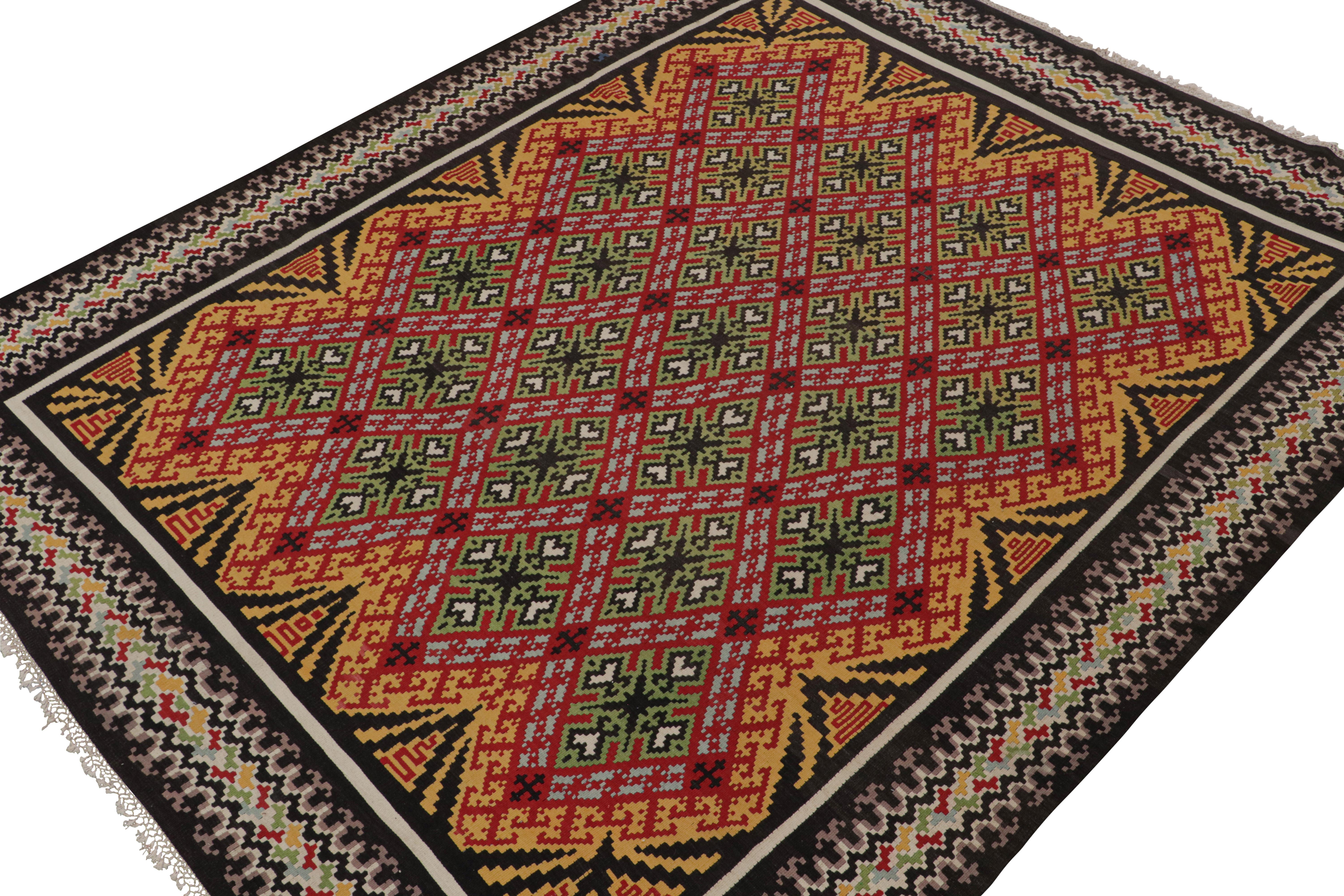 Handwoven in wool circa 1950-1960, this 10x12 vintage Kilim rug is believed to be a rare Balkan Kilim—an exciting new curation from Rug & Kilim. 

On the Design:

Connoisseurs will admire this as a collectible piece, both in its provenance and its