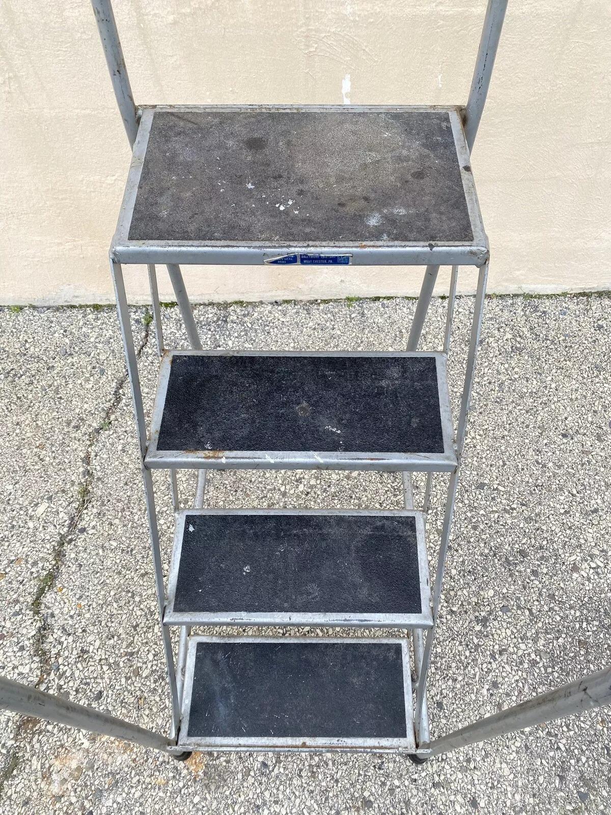 Vintage Ballymore Warehouse Garage 4 Step Metal Rolling Safety Ladder w/ Rails In Good Condition For Sale In Philadelphia, PA