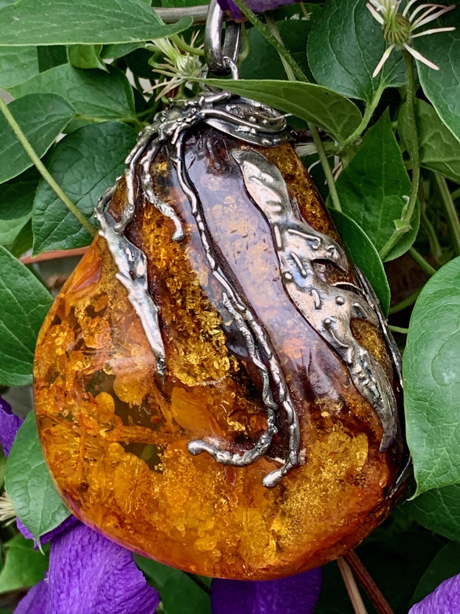 This HUGE vintage Baltic Amber drop-shaped pendant with artistic applied Silver on a Sterling Silver choker style necklace is absolutely stunning, breathtaking, show-stopping; it's simply amazing!  

It is stamped with European hallmarks near its