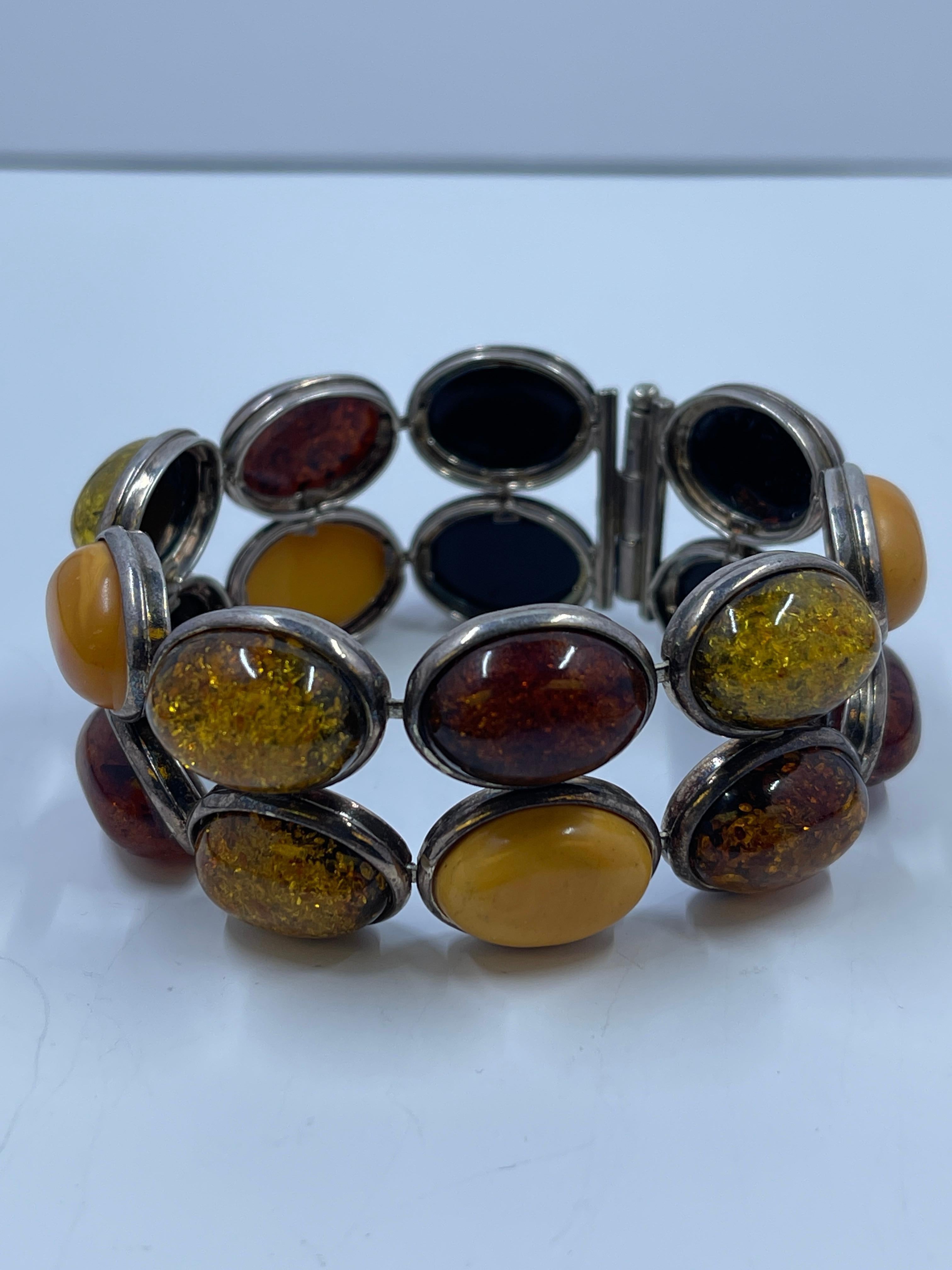 Vintage baltic amber and sterling silver bracelet. Good preowned vintage condition. Measures approximately 7 1/2