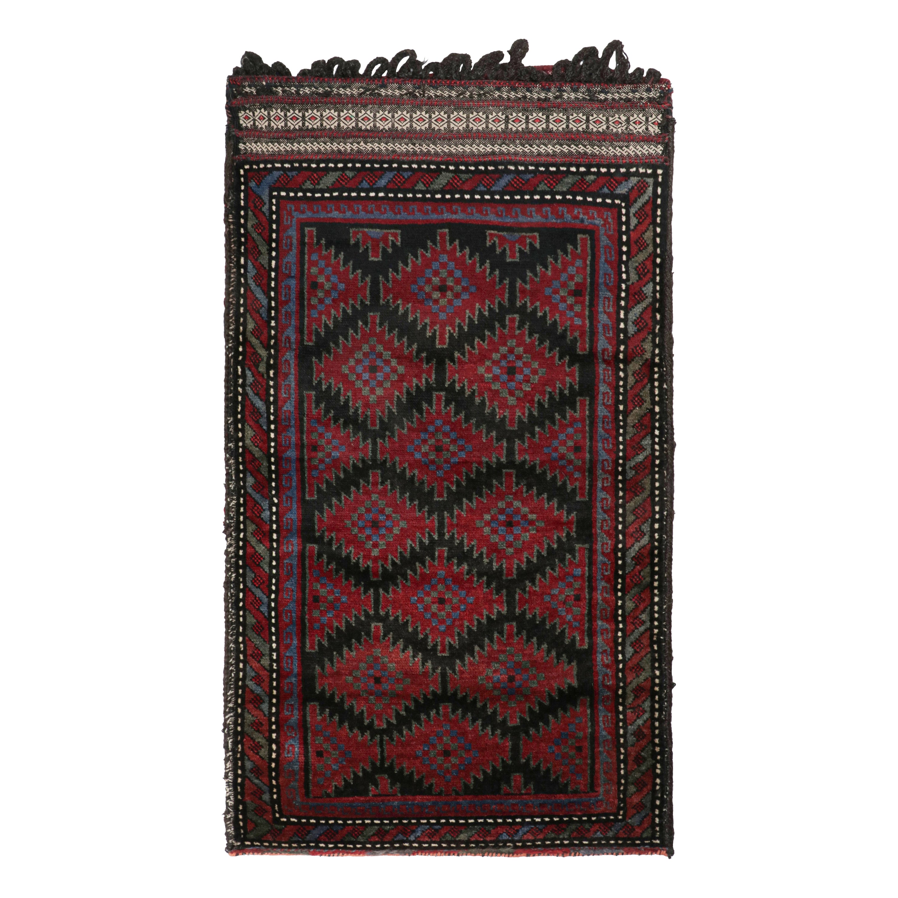 Vintage Belutsch Afghan Teppich in Schwarz & Rot Stammes-Muster von Rug & Kilim