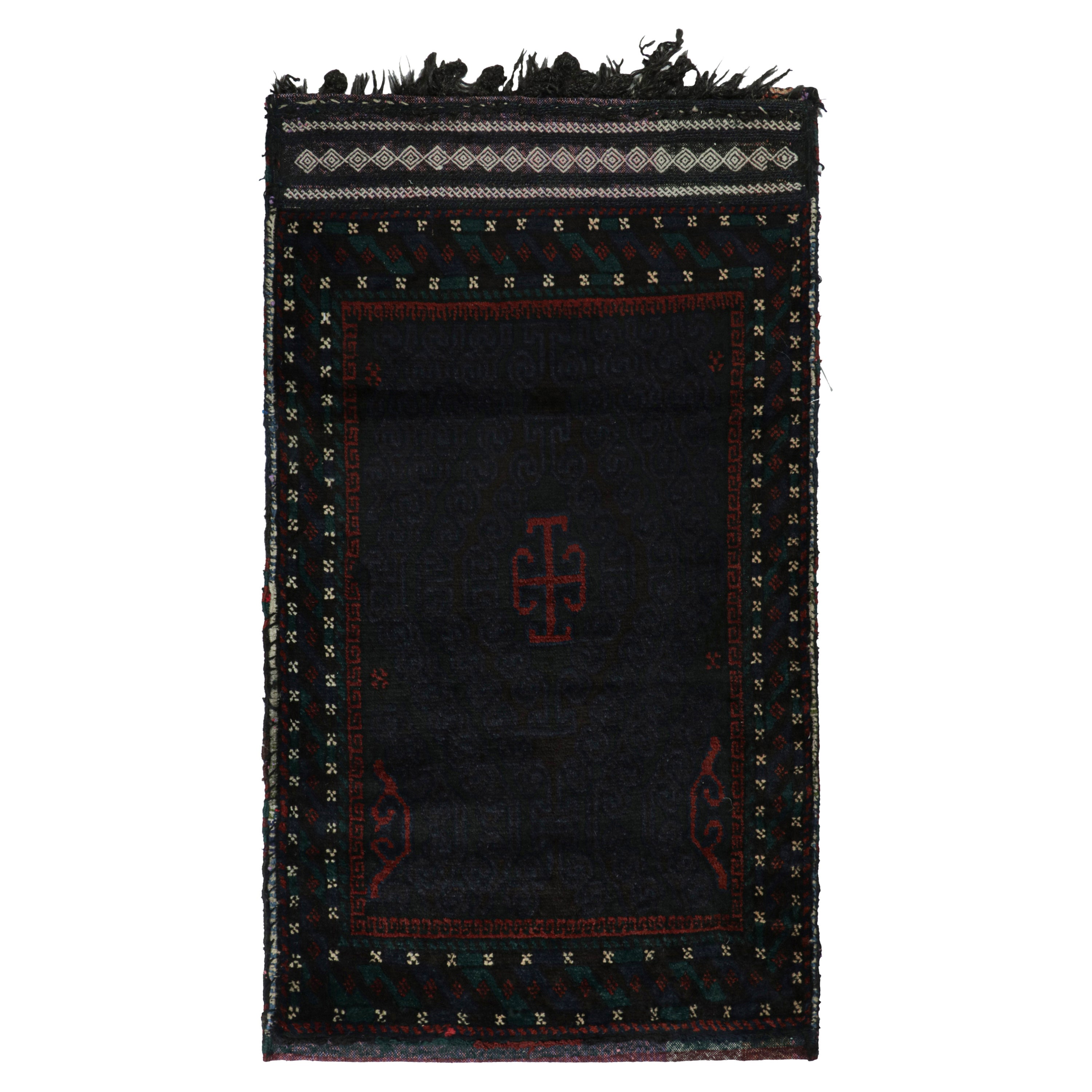 Tappeto afgano Baluch vintage con motivi tribali blu, neri e rossi da Rug & Kilim