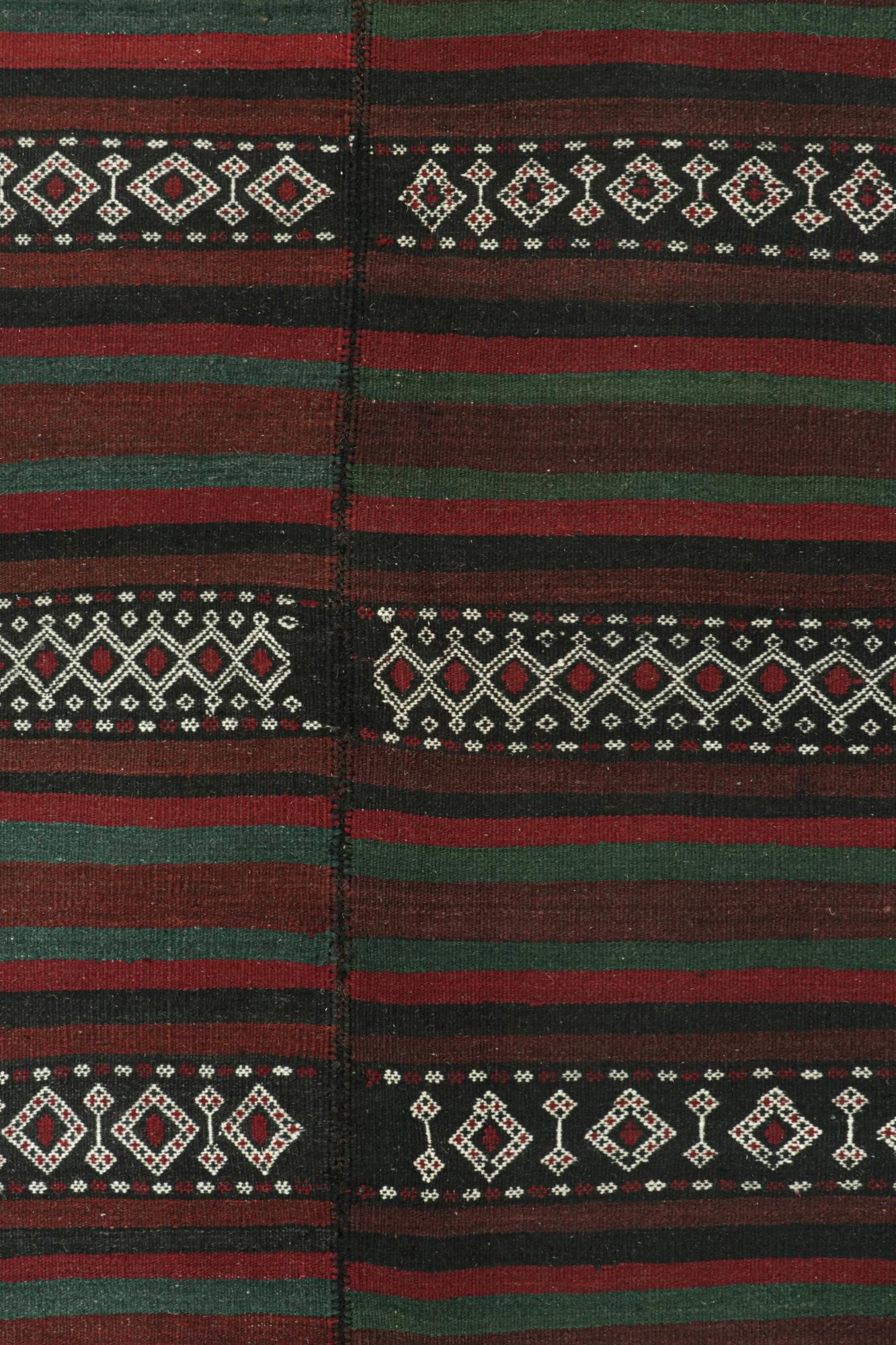 Tribal Vintage Baluch Persian Kilim with Stripes & Geometric Patterns For Sale