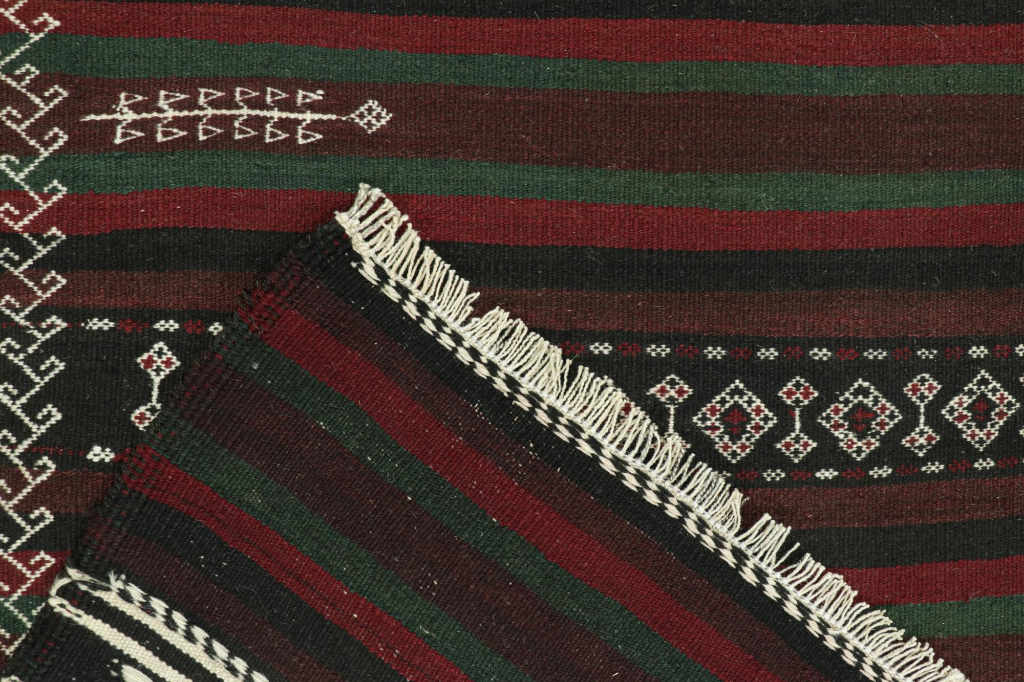 Wool Vintage Baluch Persian Kilim with Stripes & Geometric Patterns For Sale