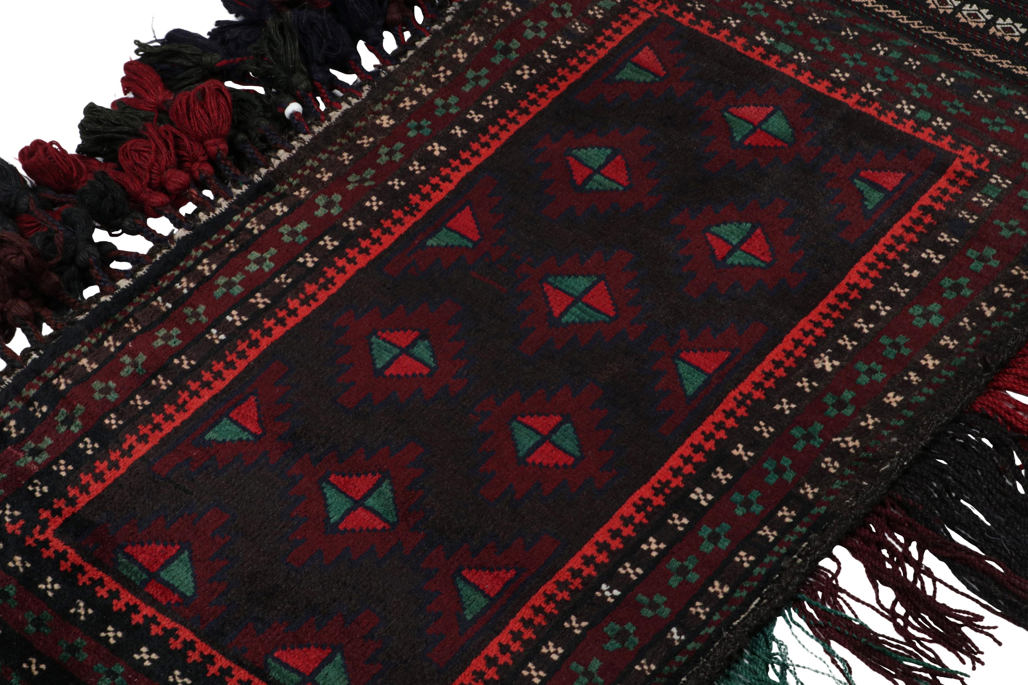 Hand-Knotted Vintage Baluch Persian rug in Black, Red & Green Patterns from Rug & Kilim For Sale
