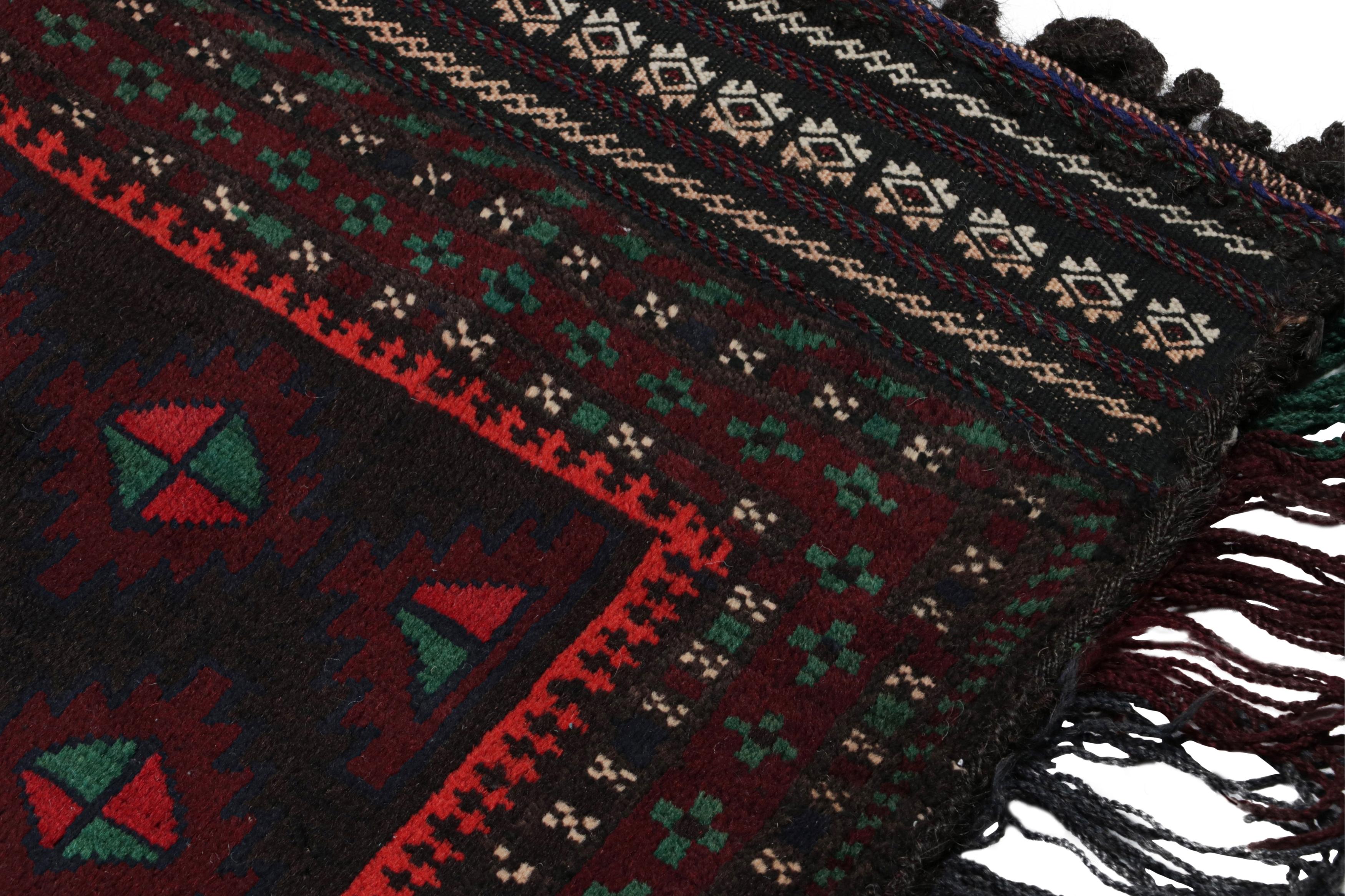 Vintage Baluch Persian rug in Black, Red & Green Patterns from Rug & Kilim In Good Condition For Sale In Long Island City, NY