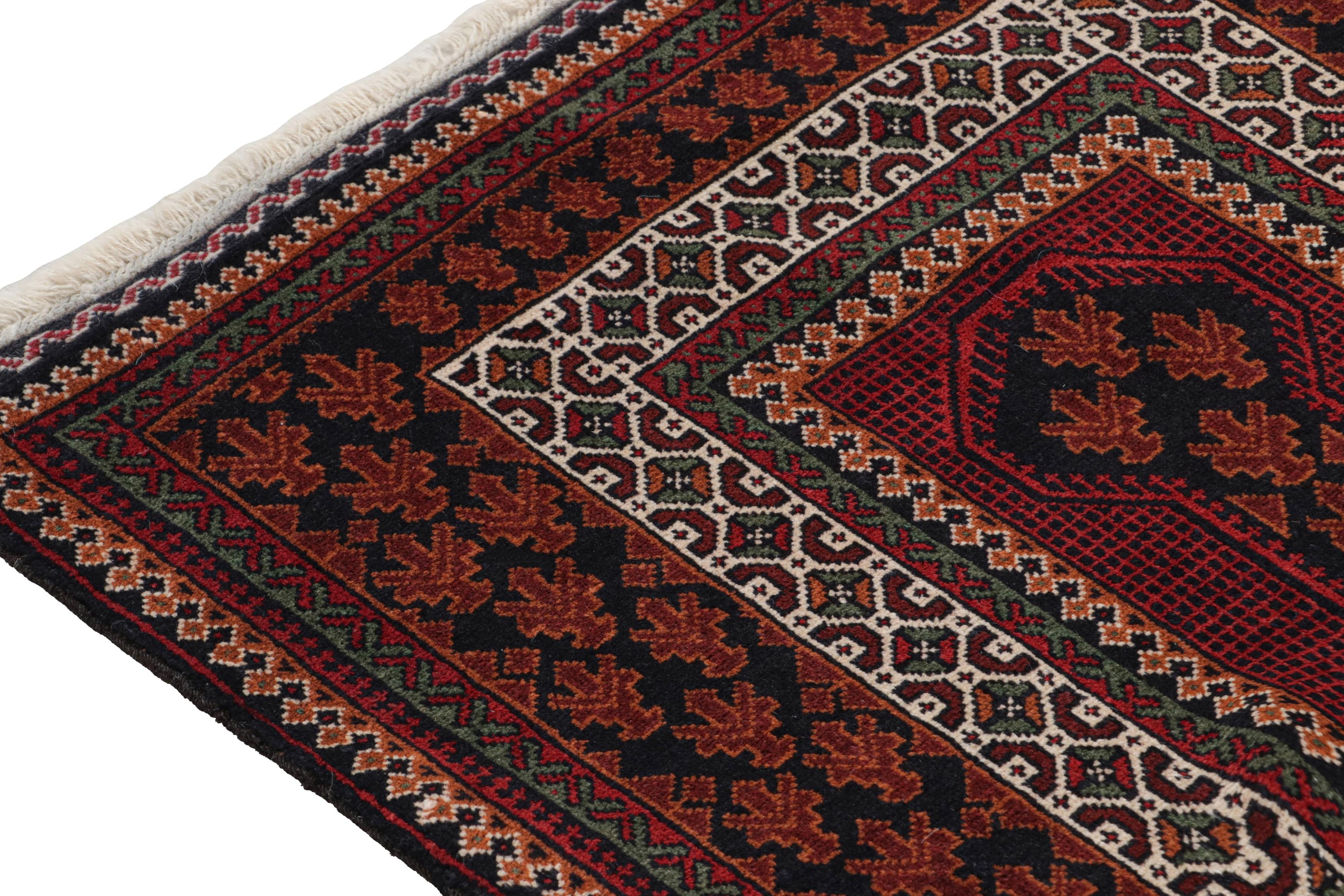 Noué à la main Tapis afghan vintage Baluch à motifs noirs, rouges, orange et blancs de Rug & Kilim en vente