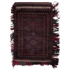 Vintage Baluch Persian rug in Black 
Red Patterns from Rug 
Kilim