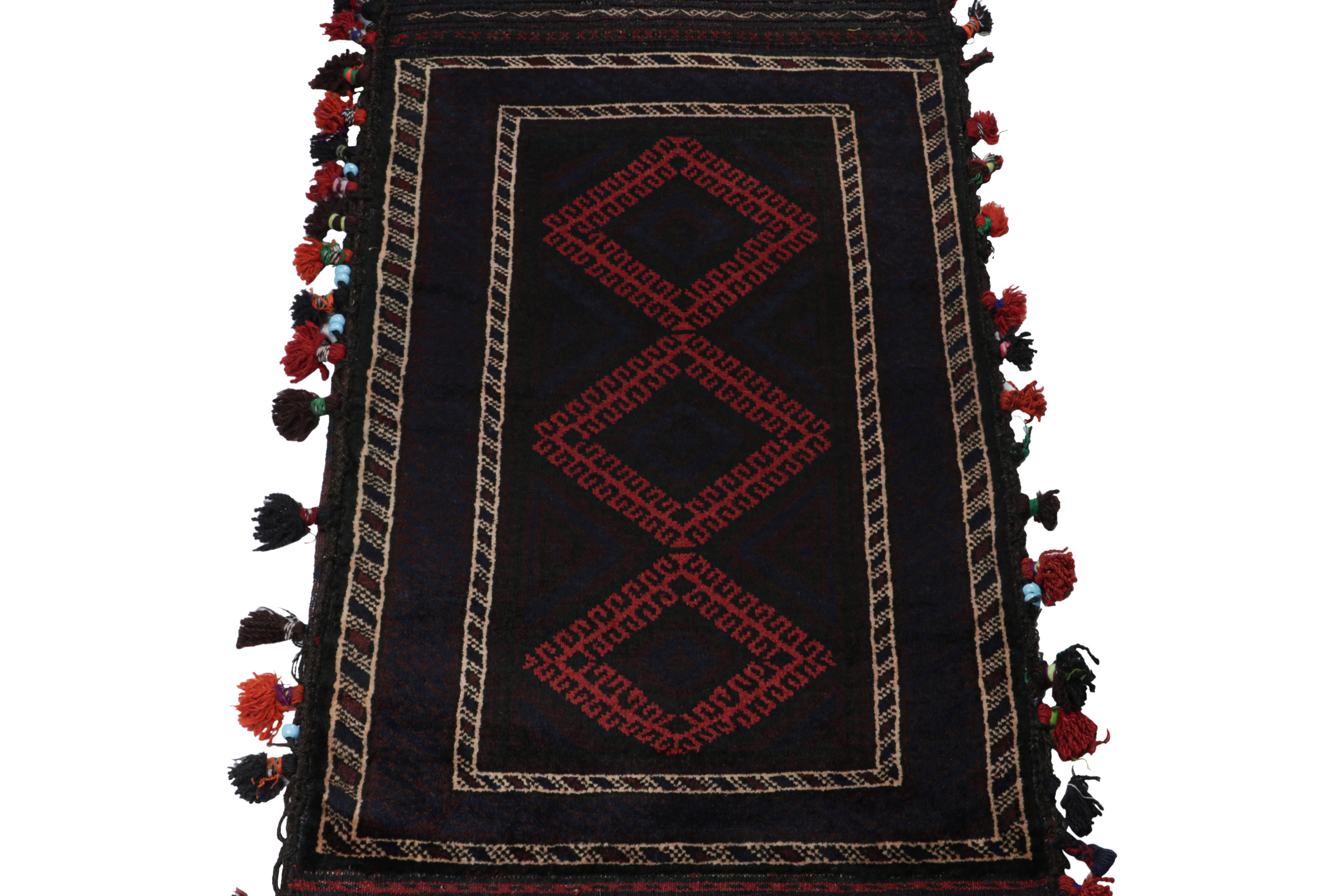 Hand-Knotted Vintage Baluch Persian rug in Black & Red Tribal Patterns from Rug & Kilim For Sale