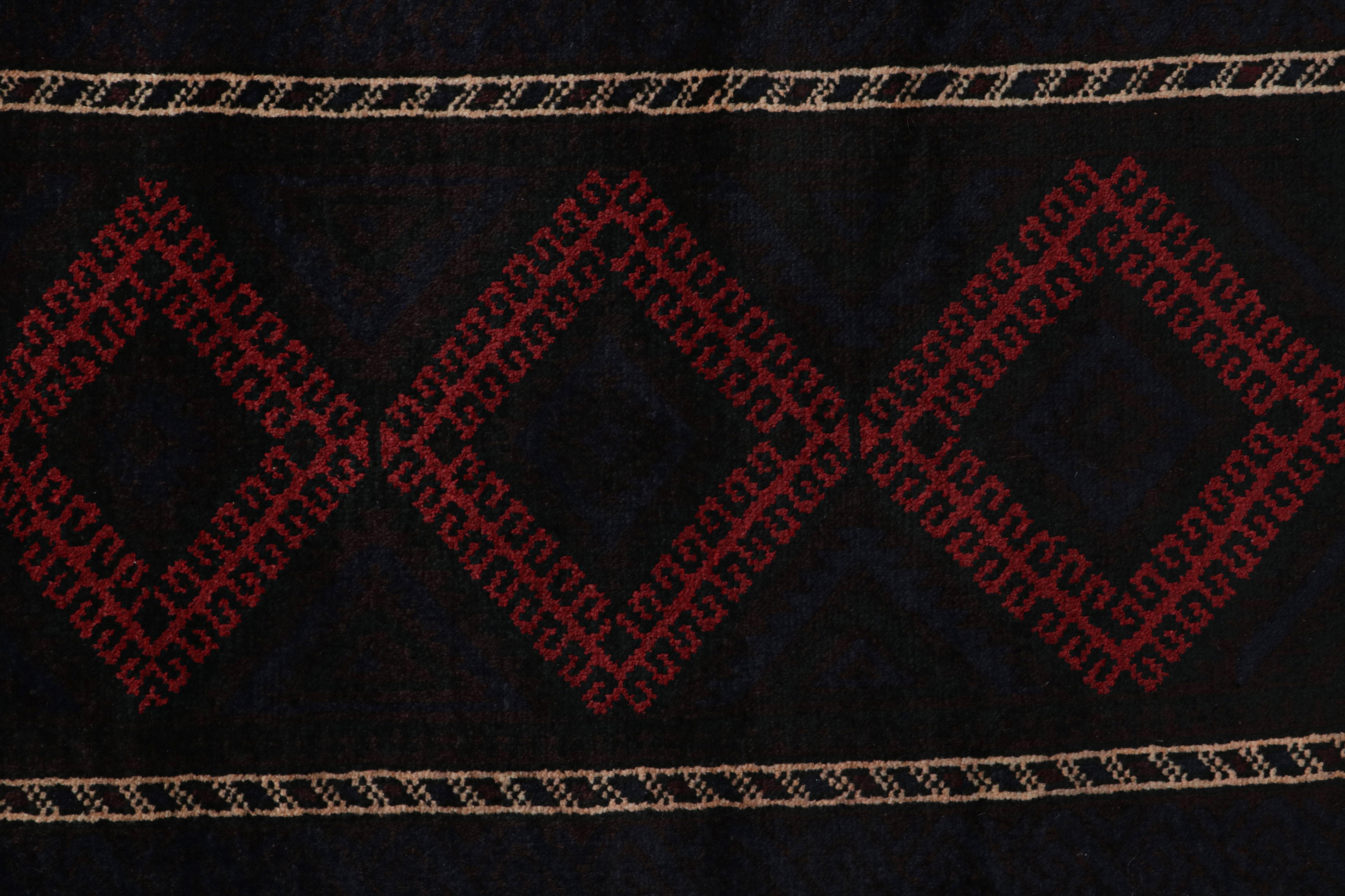 Wool Vintage Baluch Persian rug in Black & Red Tribal Patterns from Rug & Kilim For Sale