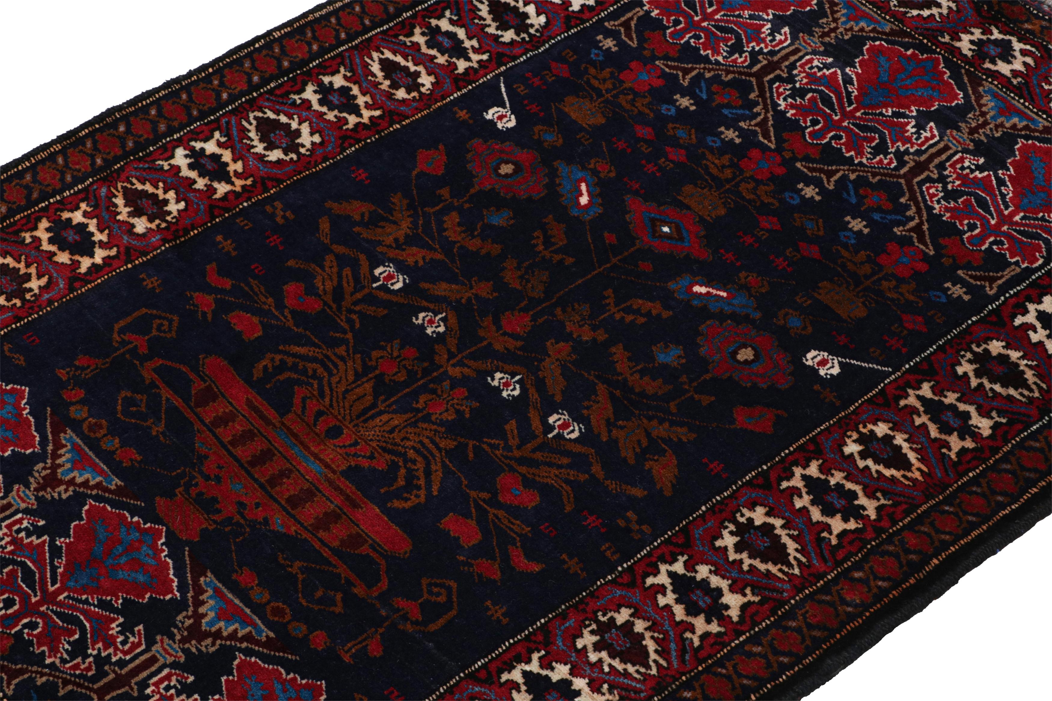 Hand-Knotted Vintage Baluch Persian rug in Blue with Red-Brown Patterns from Rug & Kilim For Sale