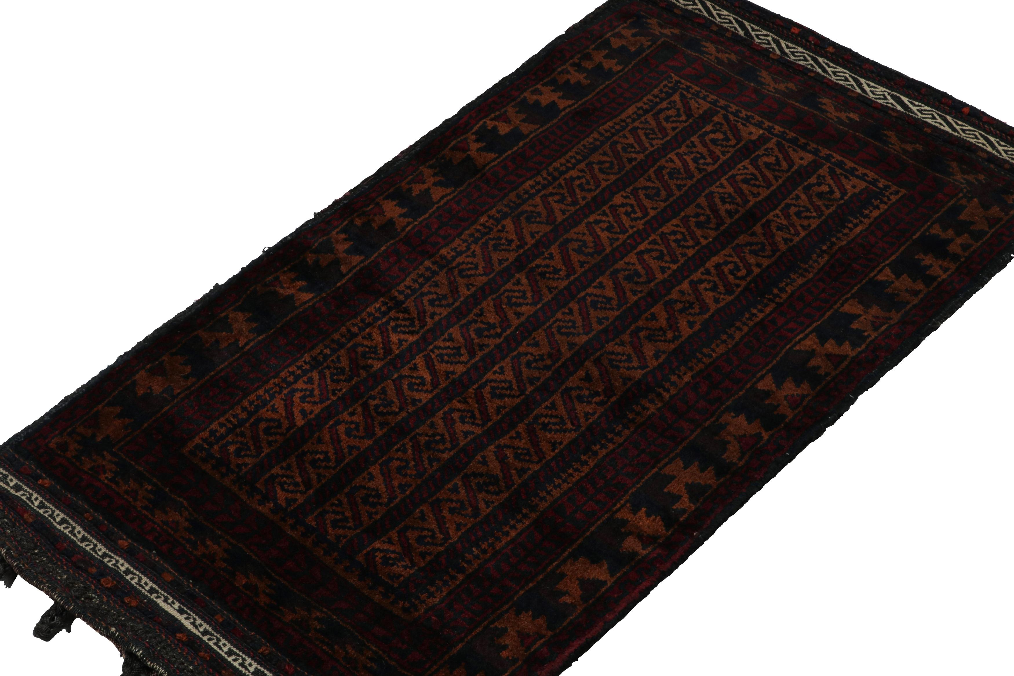 Hand-knotted in wool, this 2x3 Baluch Persian rug of the 1950s is the latest to enter Rug & Kilim’s Antique & Vintage collection.

On the Design:

The vintage rug carries tribal patterns in rich tones of red, blue & brown. The field is encased in