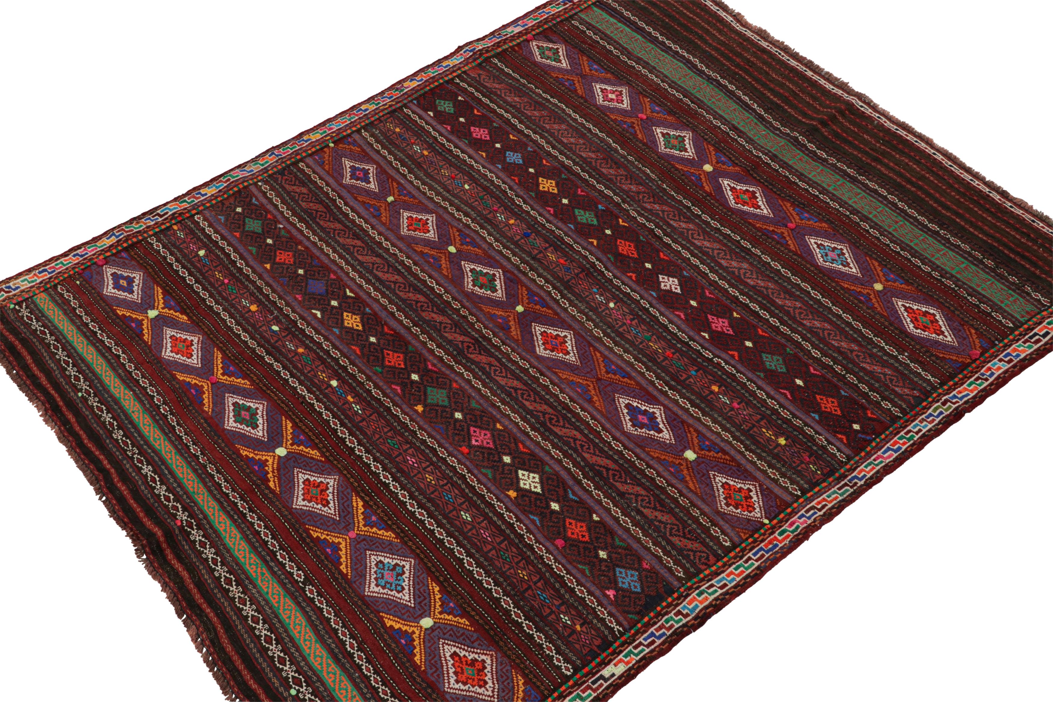 Hand-knotted in wool, this 5x6 Baluch Persian rug of the 1950s is the latest to enter Rug & Kilim’s Antique & Vintage collection.

On the Design:

The piece carries tribal patterns in horizontal stripes alternating in polychromatic tones. Carrying