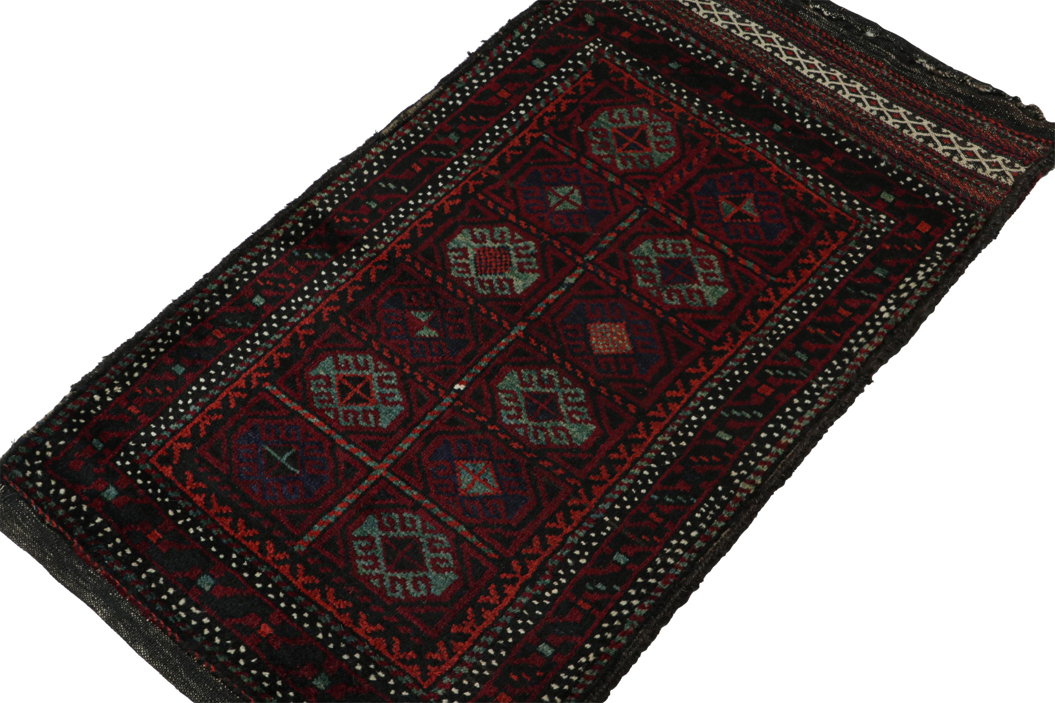 Hand-knotted in wool, this 2x4 Baluch Persian rug of the 1950s is the latest to enter Rug & Kilim’s Antique & Vintage collection.

On the Design:

The vintage Baluch rug carries tribal patterns encased in octagons relishing black, white, green, blue