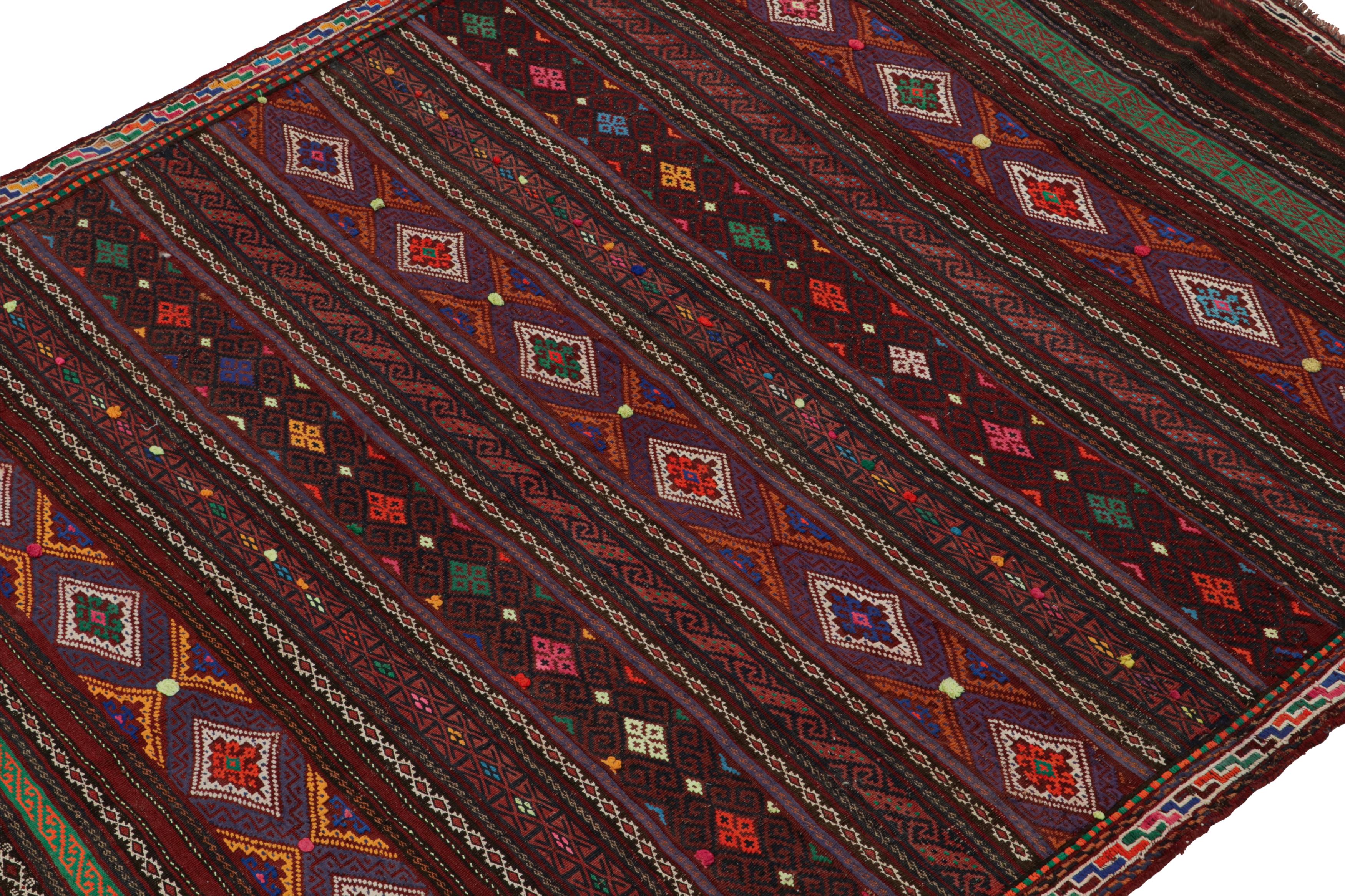 Hand-Knotted Vintage Baluch Persian rug in Polychromatic Patterns from Rug & Kilim For Sale