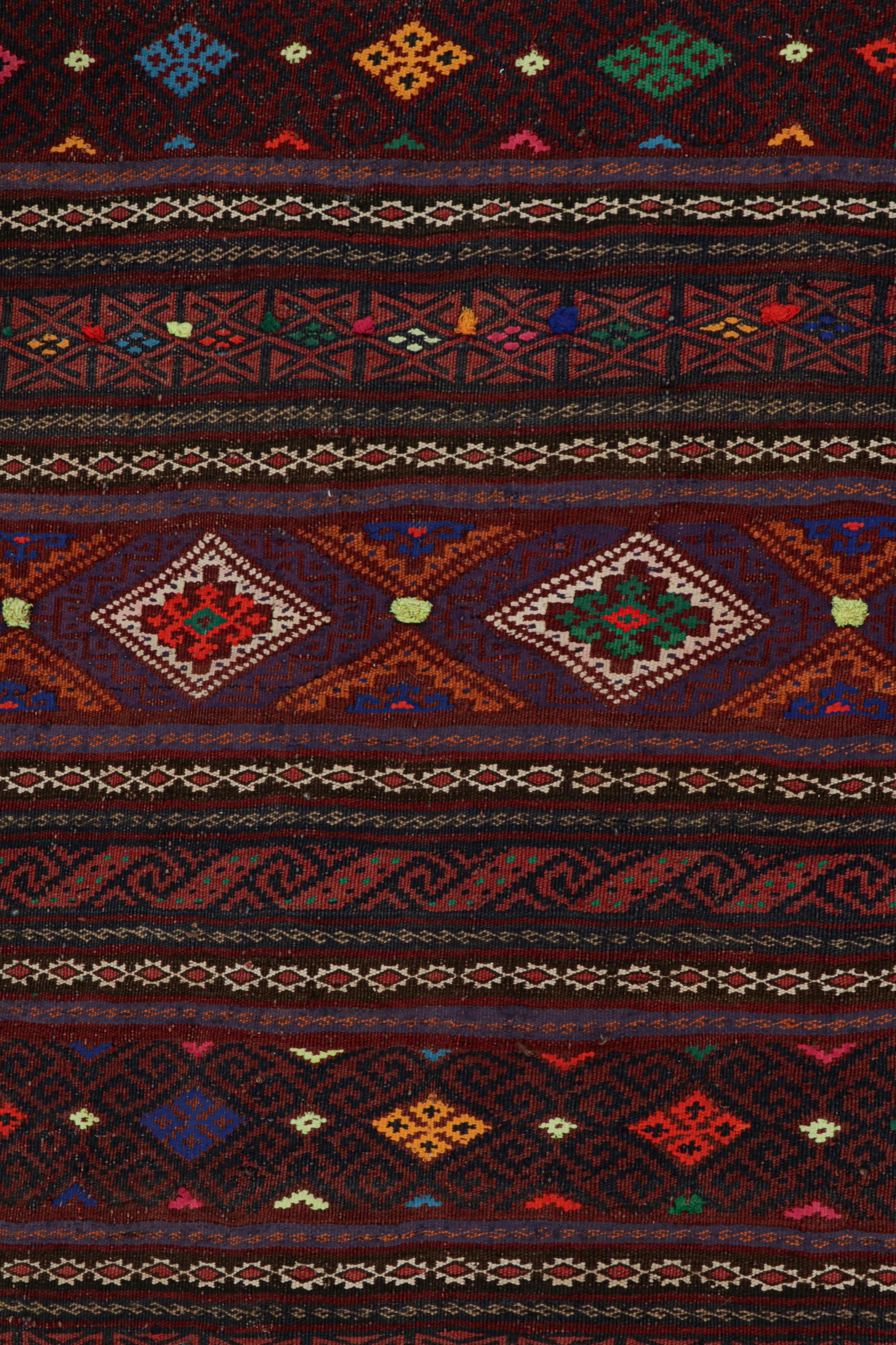 Mid-20th Century Vintage Baluch Persian rug in Polychromatic Patterns from Rug & Kilim For Sale