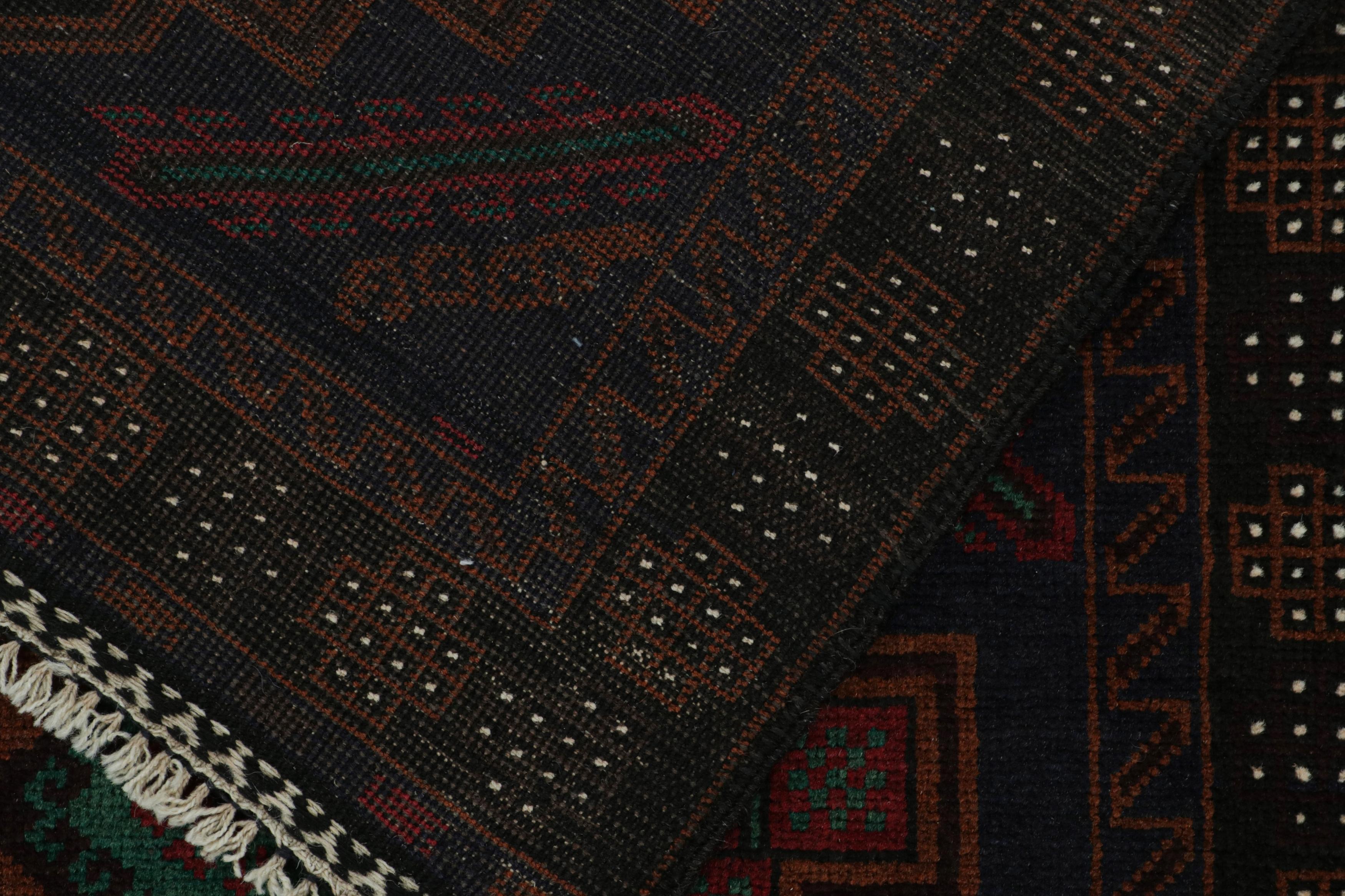 Wool Vintage Baluch Persian rug in Polychromatic Patterns from Rug & Kilim For Sale