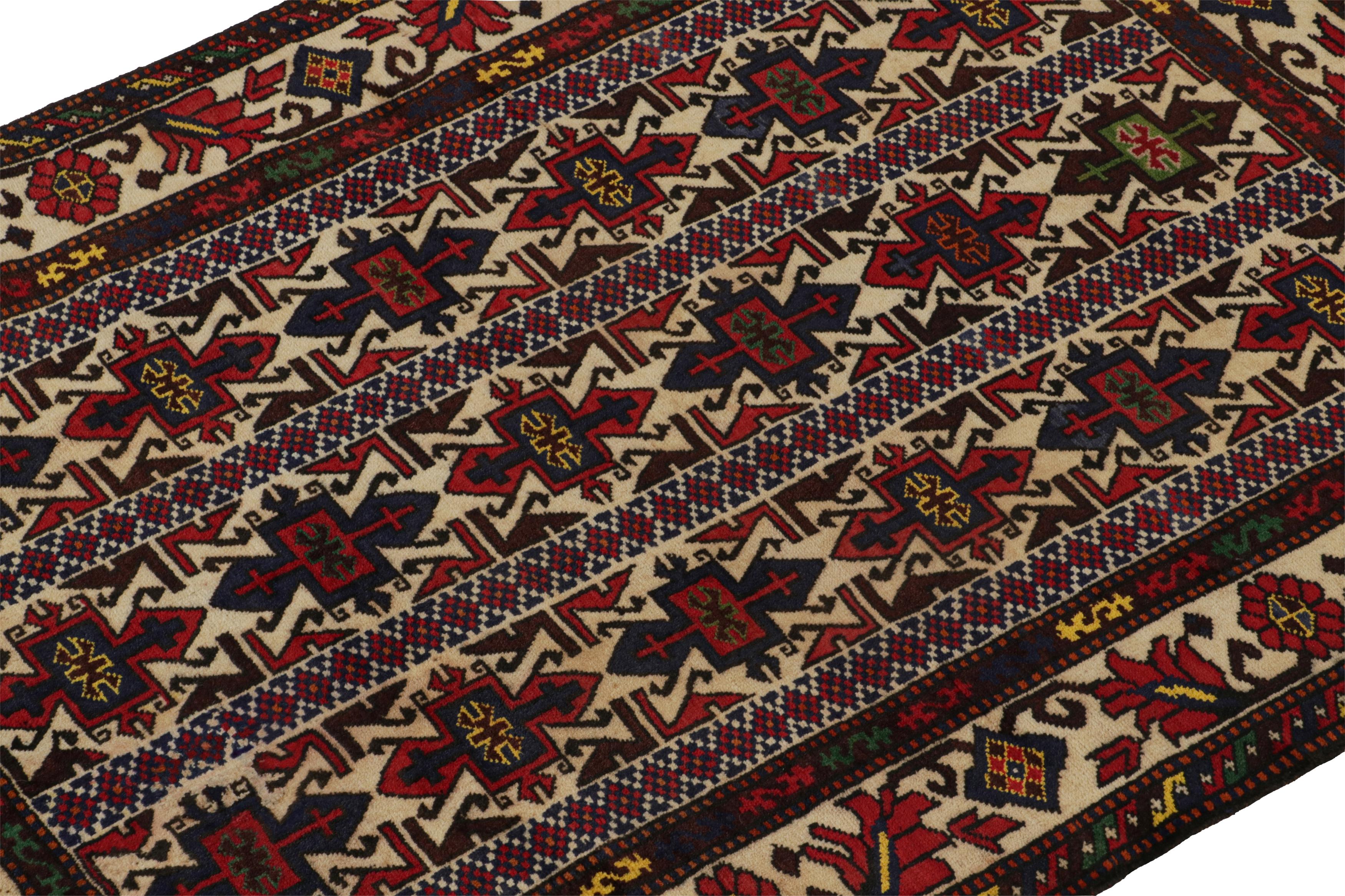 Hand-Knotted Vintage Baluch Persian rug in Red, Beige, Blue & Brown Patterns from Rug & Kilim For Sale