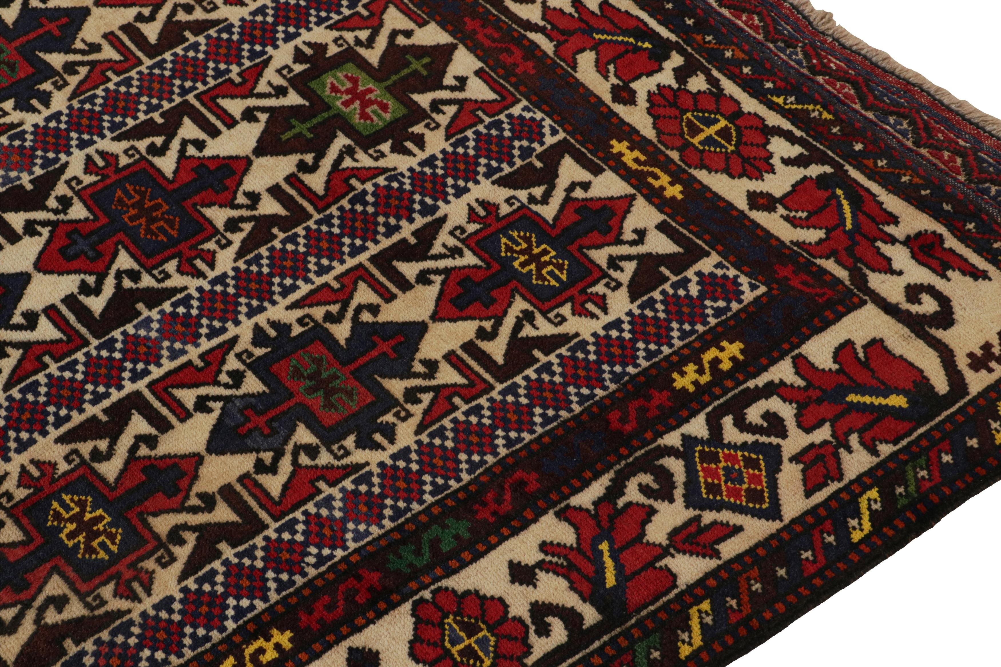 Vintage Baluch Persian rug in Red, Beige, Blue & Brown Patterns from Rug & Kilim In Good Condition For Sale In Long Island City, NY