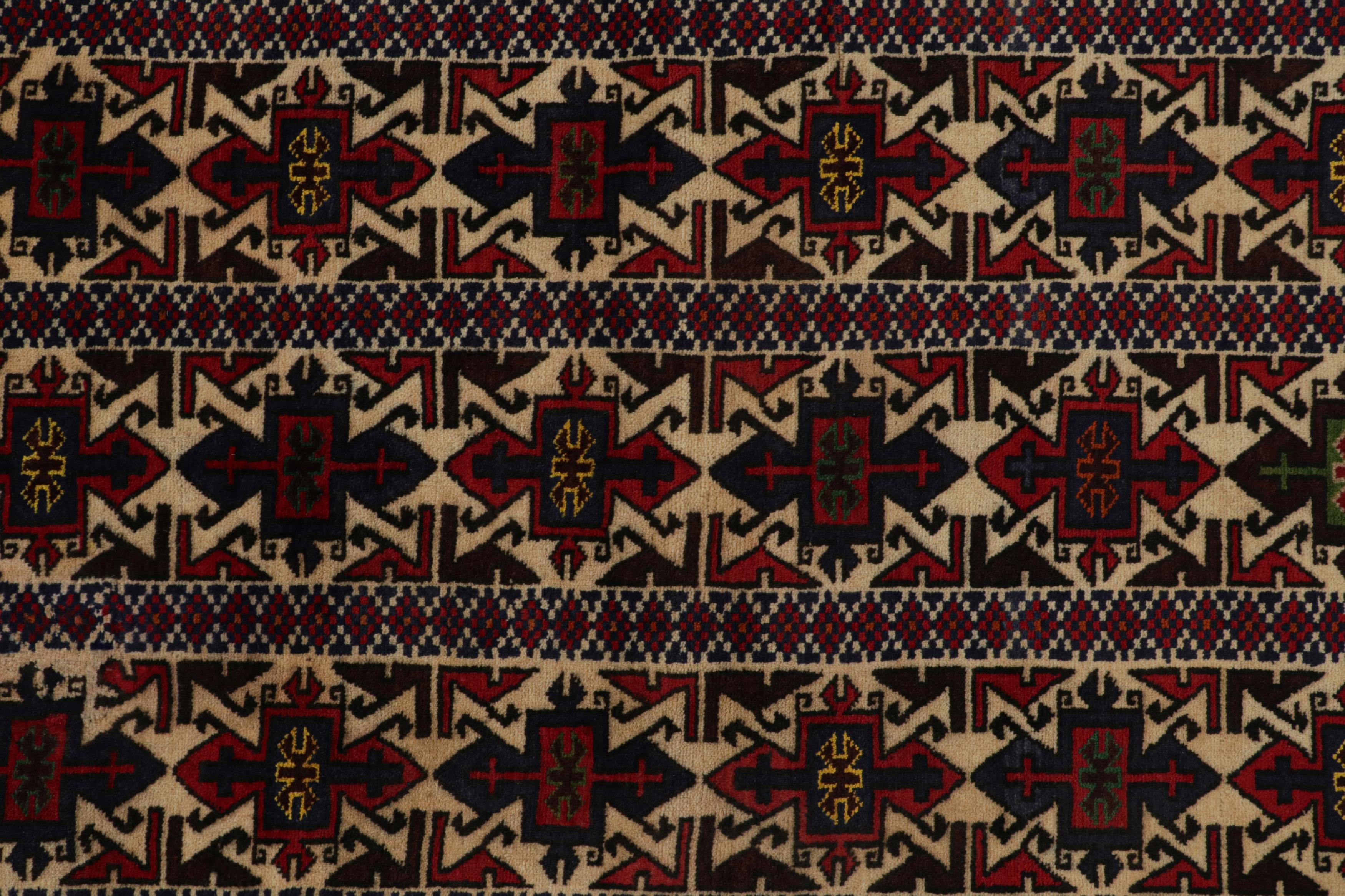 Mid-20th Century Vintage Baluch Persian rug in Red, Beige, Blue & Brown Patterns from Rug & Kilim For Sale