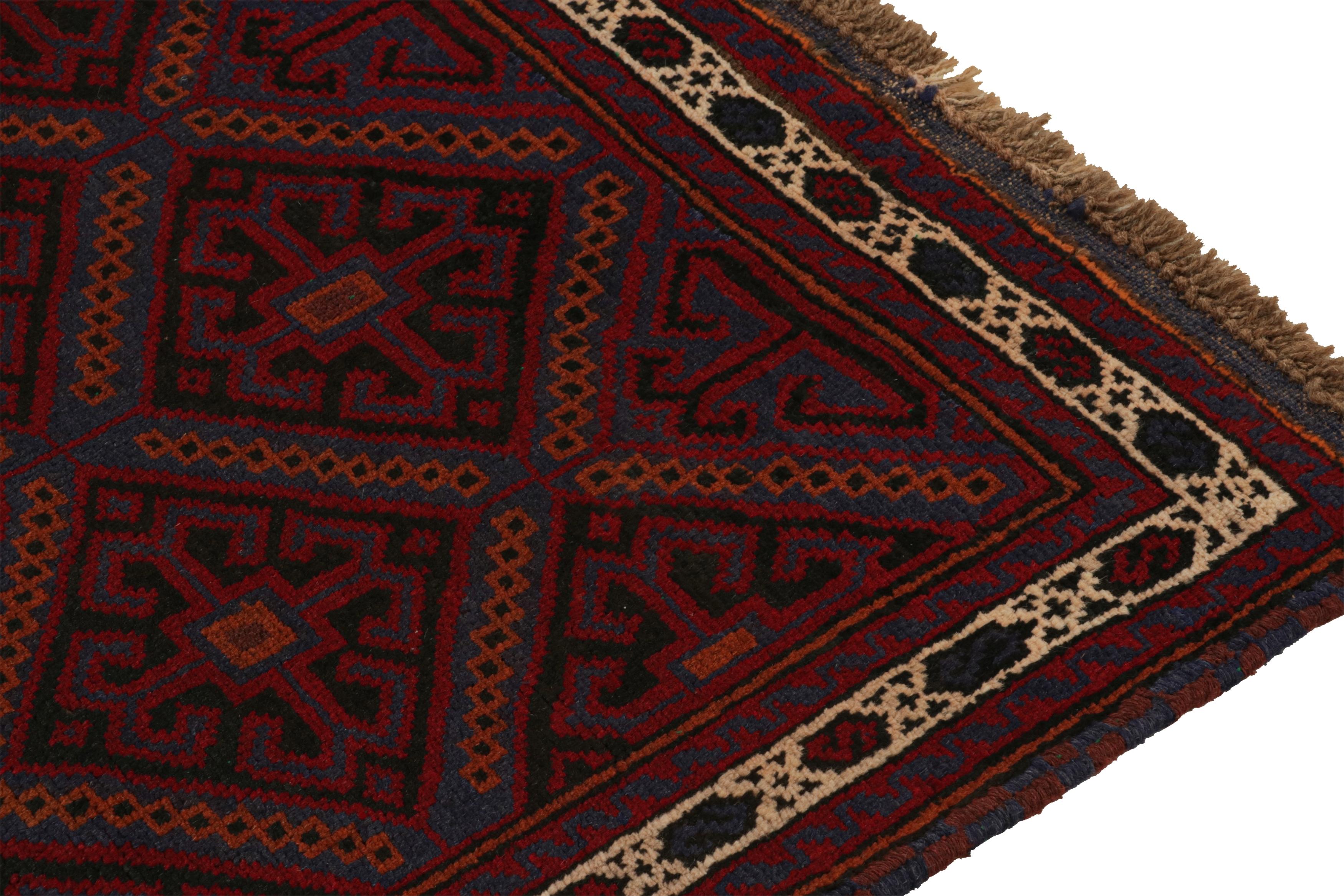 Vintage Baluch Afghan rug in Red, Black, Blue & Brown Patterns from Rug & Kilim In Good Condition For Sale In Long Island City, NY