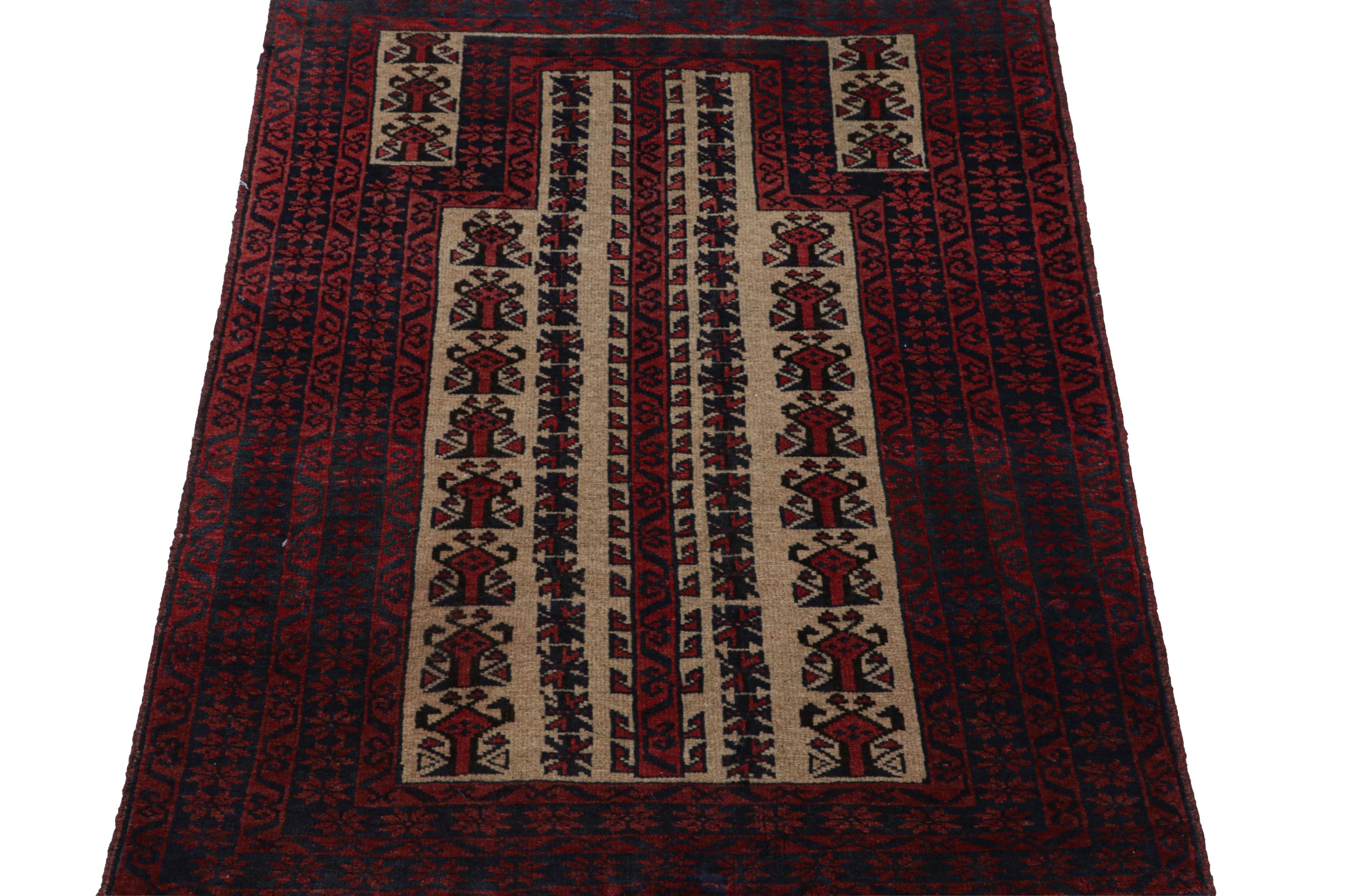 Tribal Vintage Baluch Persian rug in Red, Blue & Beige Patterns from Rug & Kilim For Sale