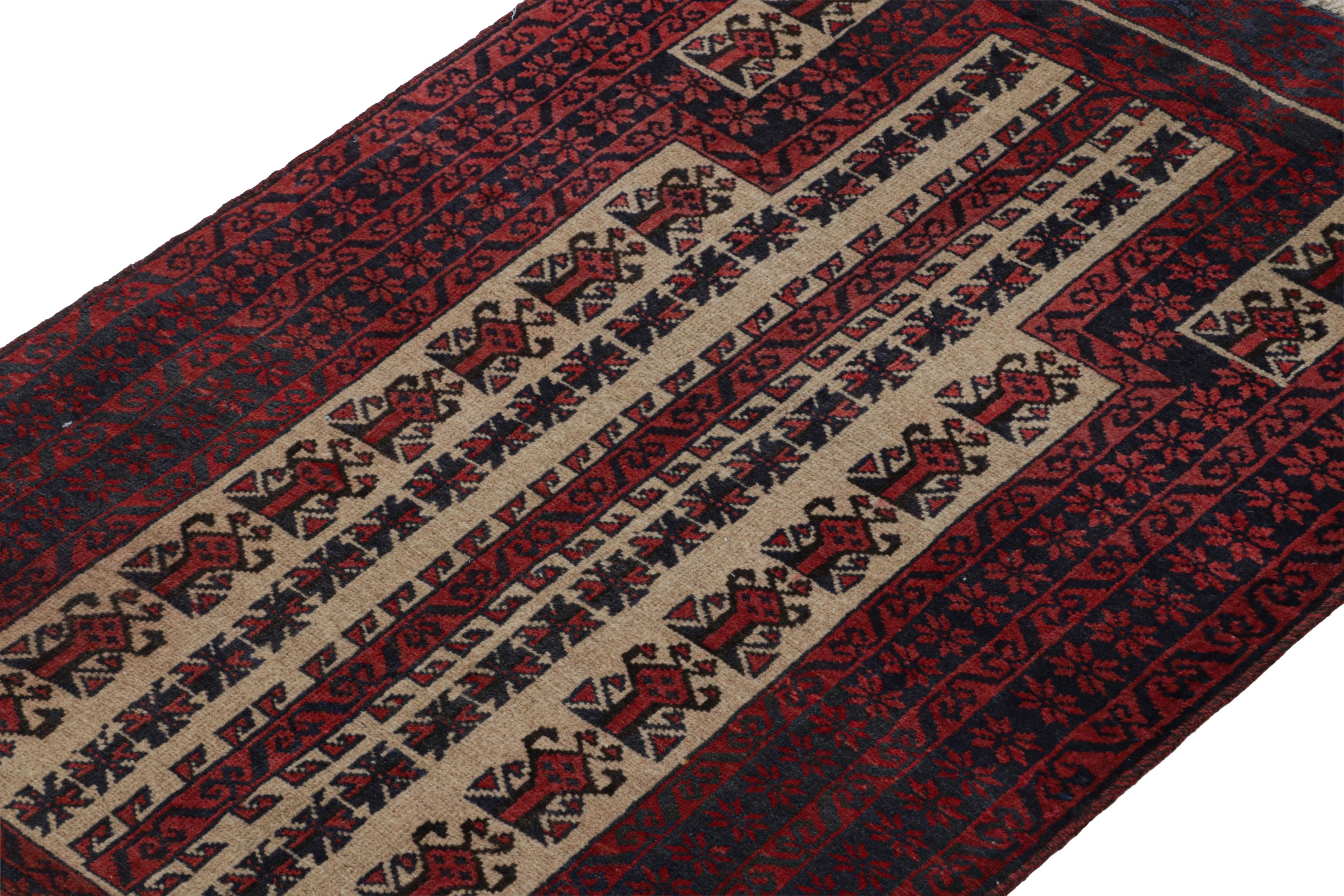 Hand-Knotted Vintage Baluch Persian rug in Red, Blue & Beige Patterns from Rug & Kilim For Sale