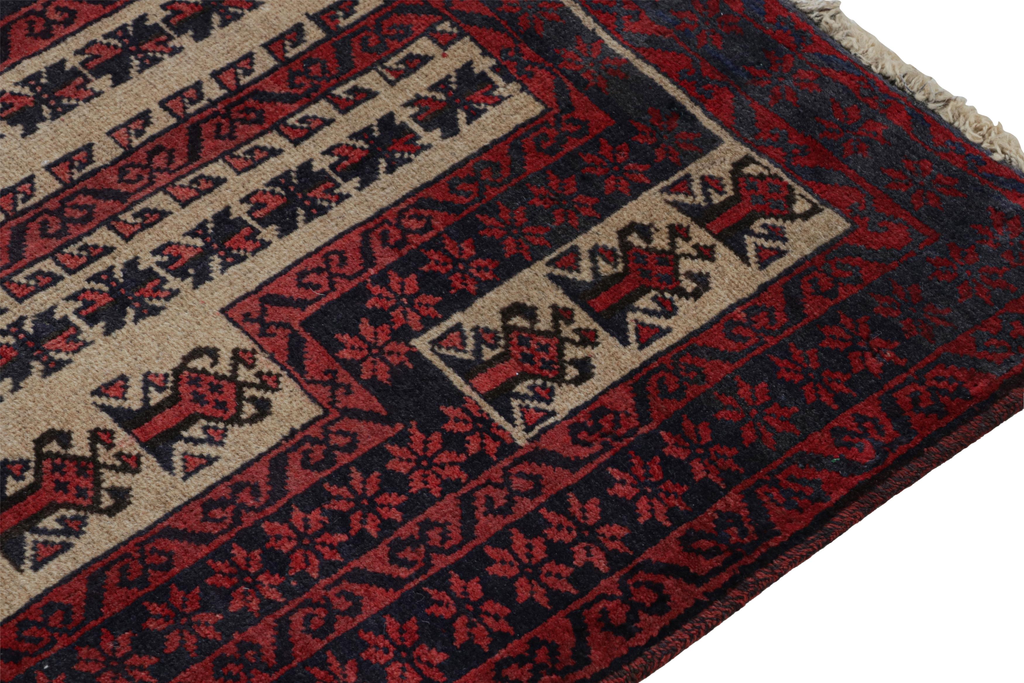 Vintage Baluch Persian rug in Red, Blue & Beige Patterns from Rug & Kilim In Good Condition For Sale In Long Island City, NY