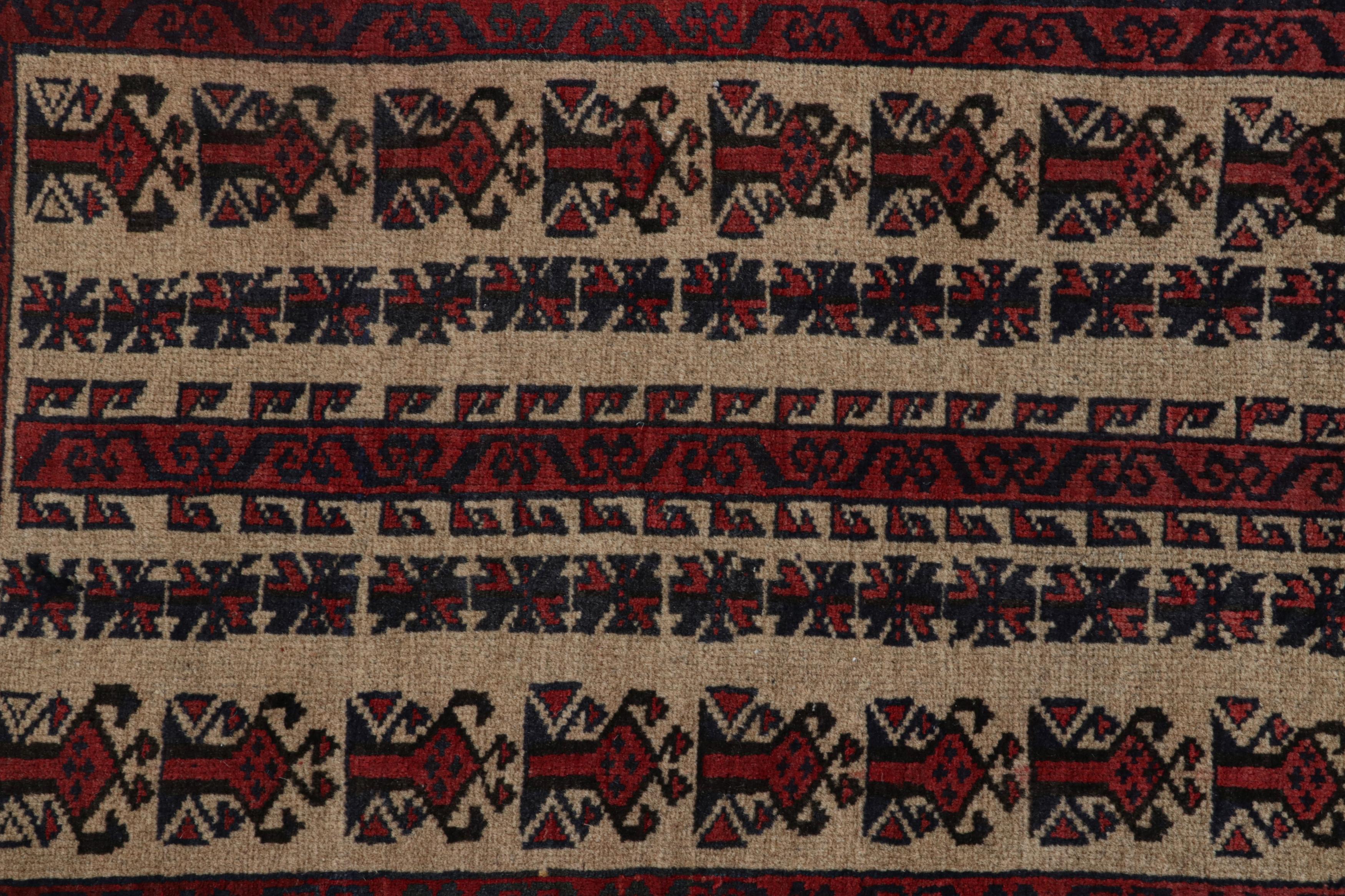 Mid-20th Century Vintage Baluch Persian rug in Red, Blue & Beige Patterns from Rug & Kilim For Sale