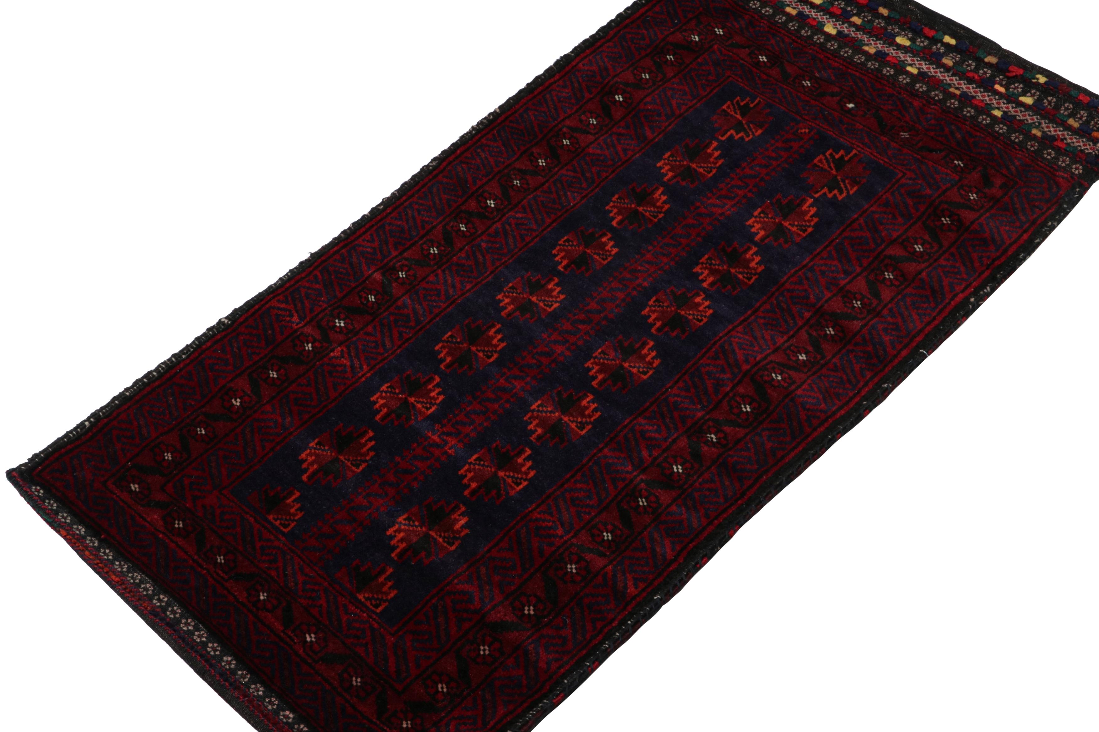 Hand-knotted in wool, this 2x4 Baluch Persian rug of the 1950s is the latest to enter Rug & Kilim’s Antique & Vintage collection.

On the Design:

The vintage rug carries tribal patterns in rich tones of red, blue & black with orange juxtapositions.