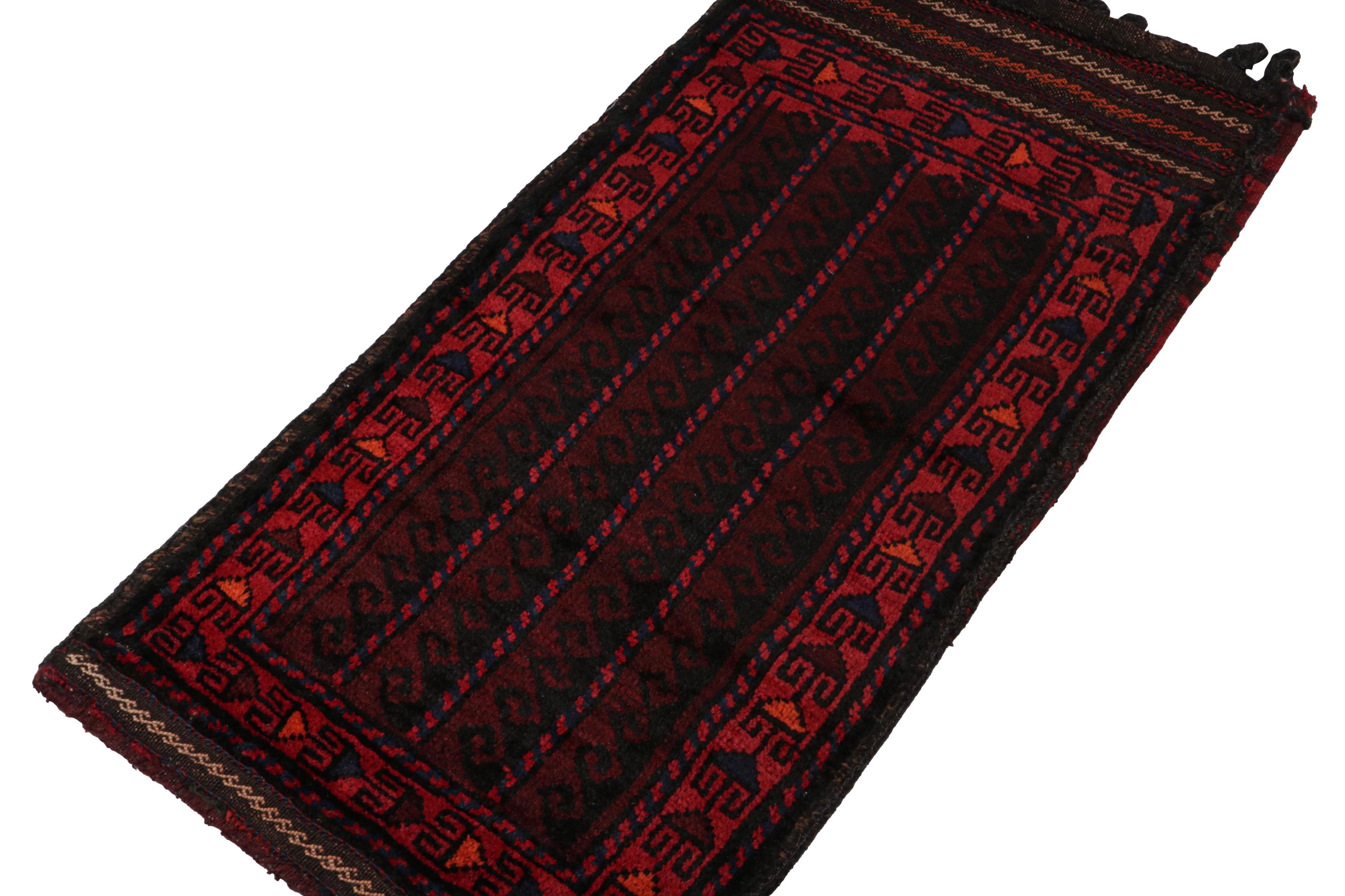 Hand-knotted in wool, this 2x3 Baluch Afghan rug of the 1950s is the latest to enter Rug & Kilim’s Antique & Vintage collection.

On the Design:

The vintage Baluch rug carries tribal patterns in rich tones of red, blue & black. The field is encased