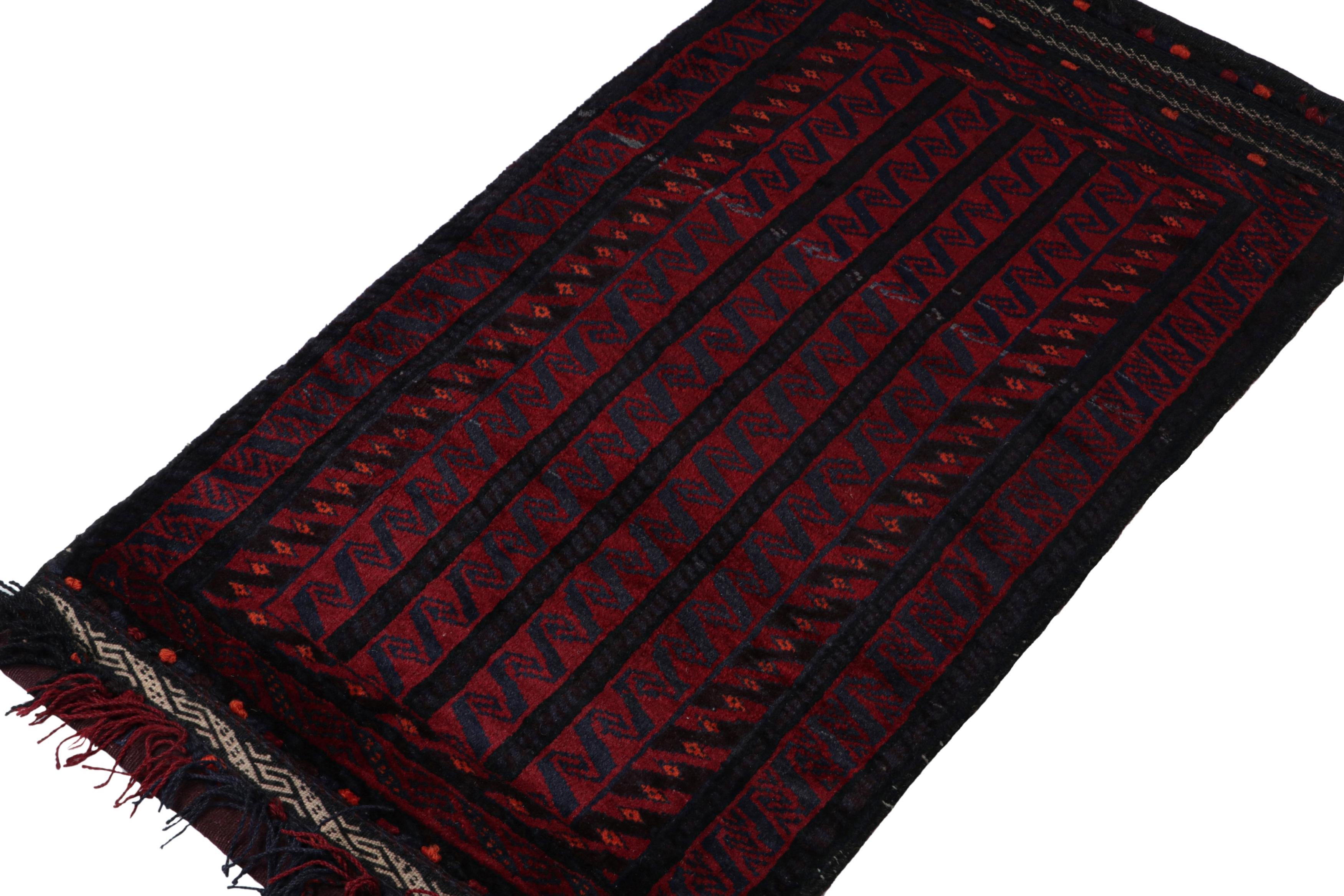 Hand-knotted in wool, this 2x3 Baluch Persian rug of the 1950s is a brand new entry to Rug & Kilim’s Antique & Vintage collection.

On the Design:

The vintage Baluch rug carries tribal patterns in rich tones of red, blue & black. The frame enjoys a