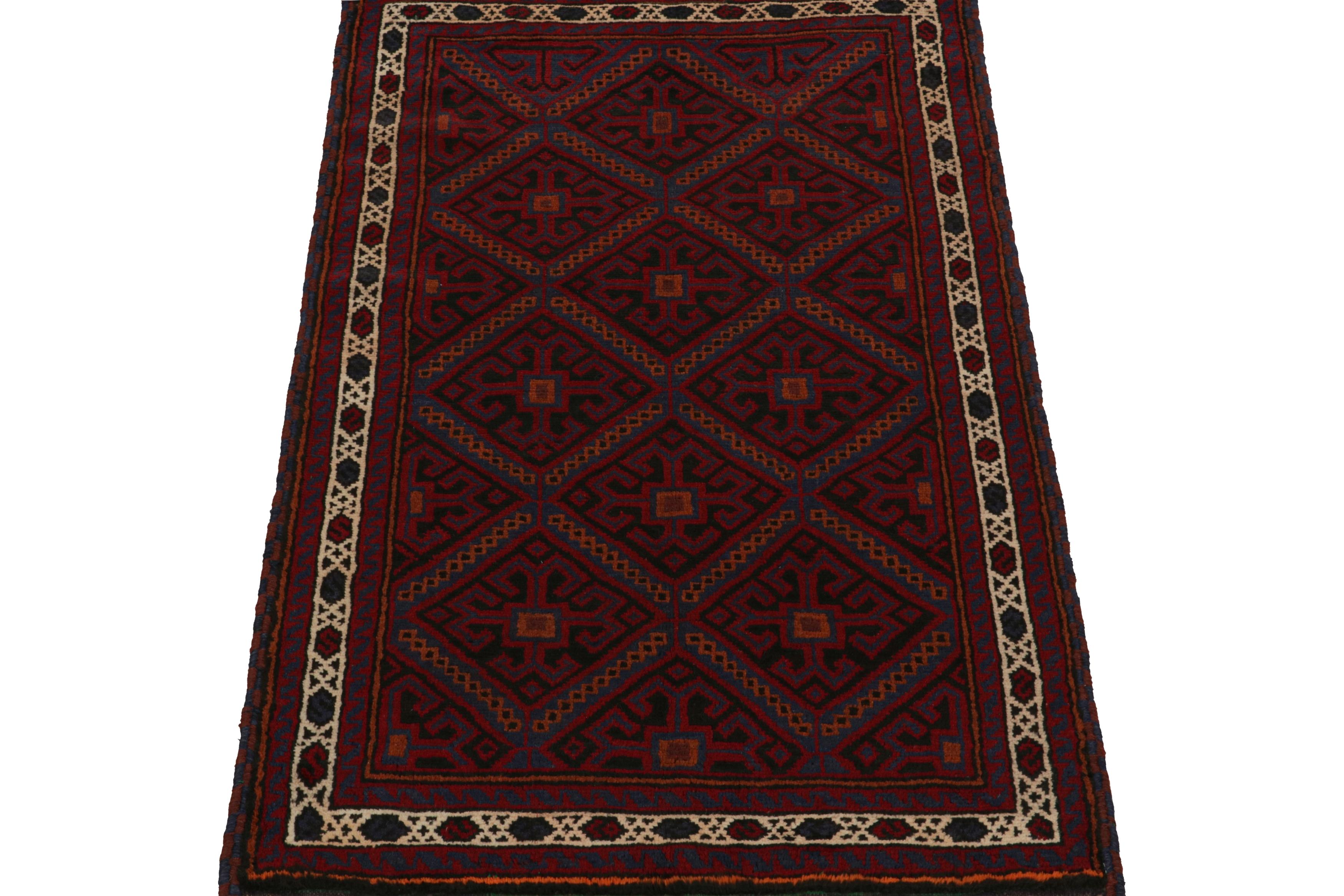 Tribal Vintage Baluch Persian rug in Red, Blue & Black Patterns from Rug & Kilim For Sale