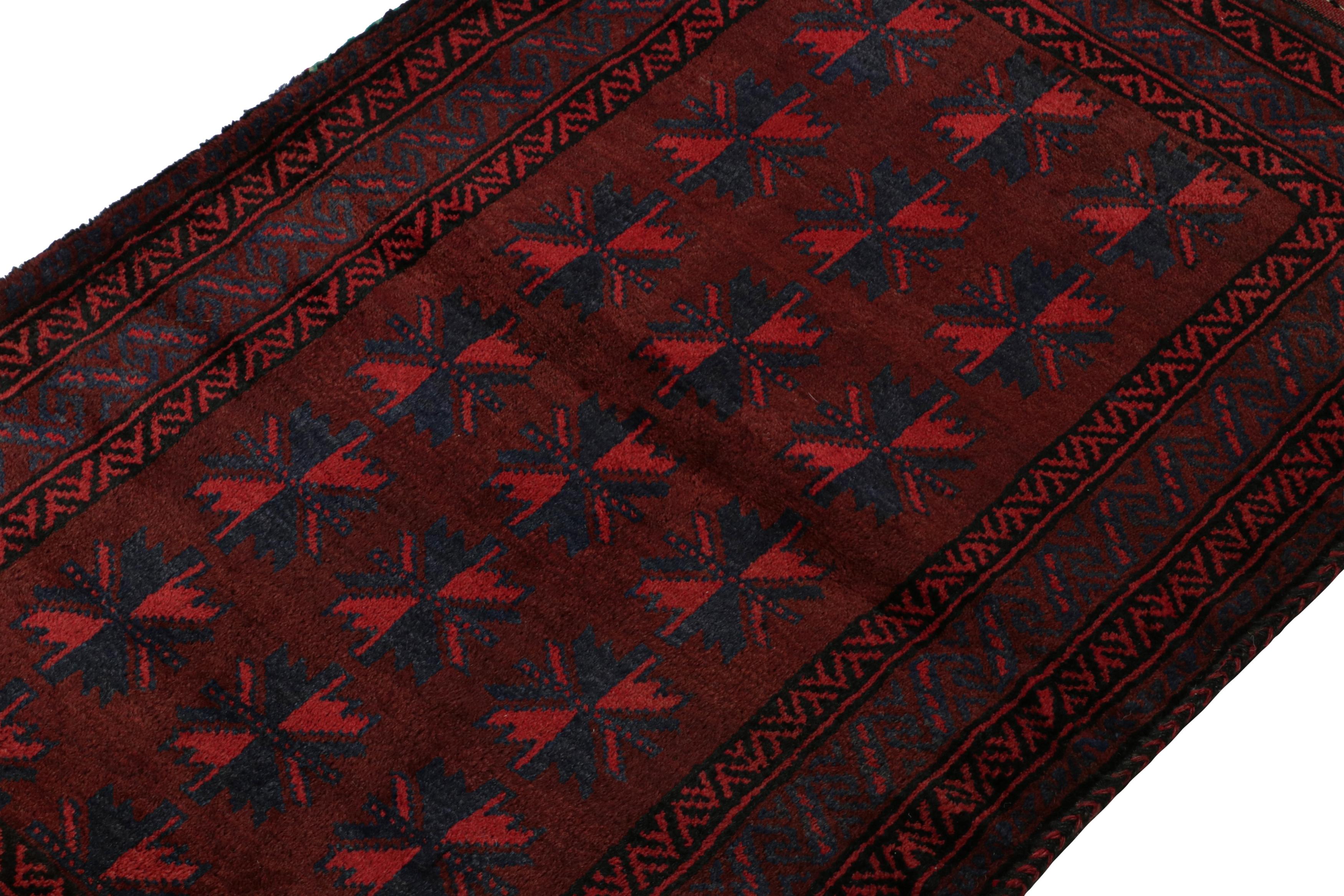 Hand-Knotted Vintage Baluch Persian rug in Red, Blue & Black Patterns from Rug & Kilim For Sale