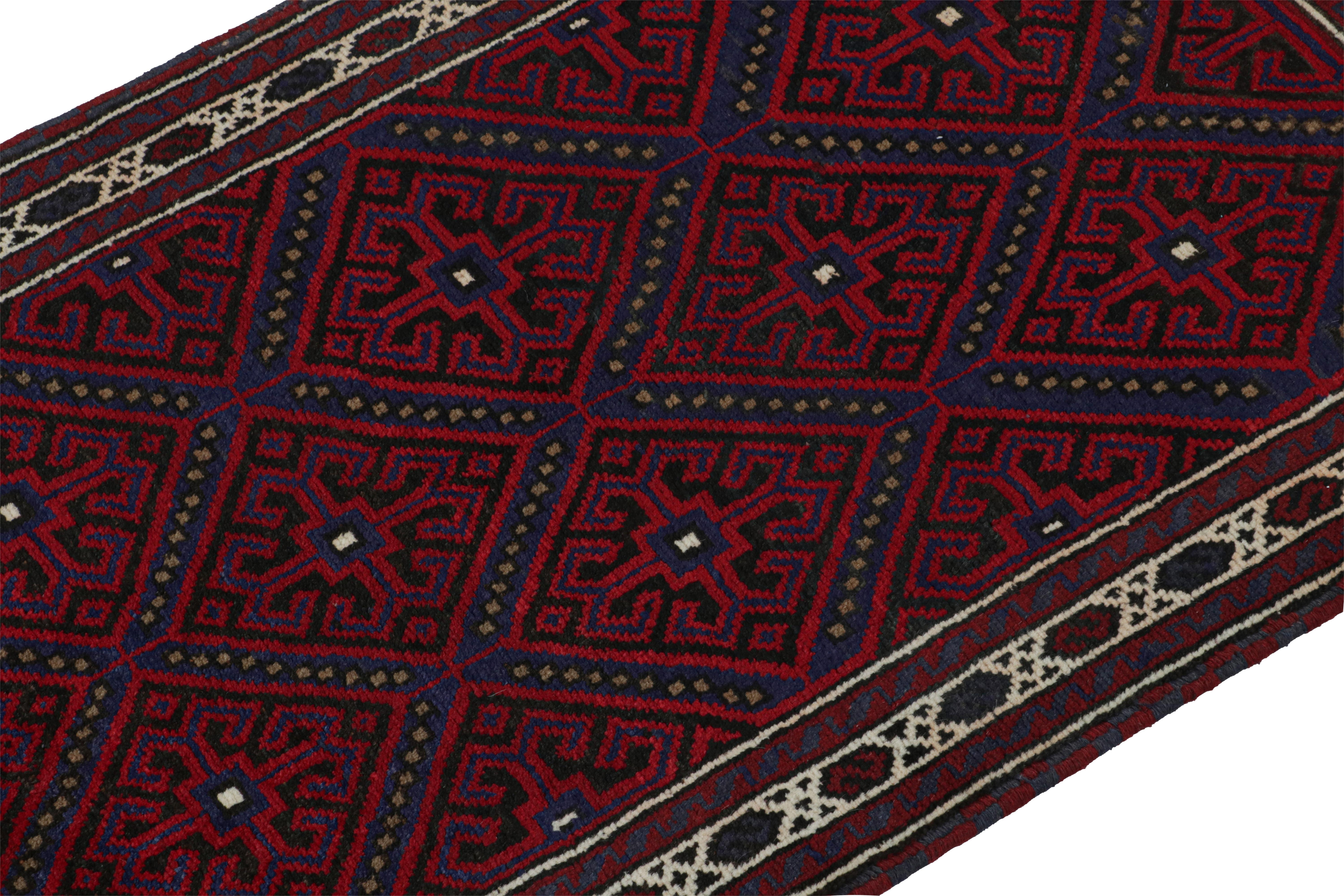 Hand-Knotted Vintage Baluch Persian rug in Red, Blue & Black Patterns from Rug & Kilim For Sale